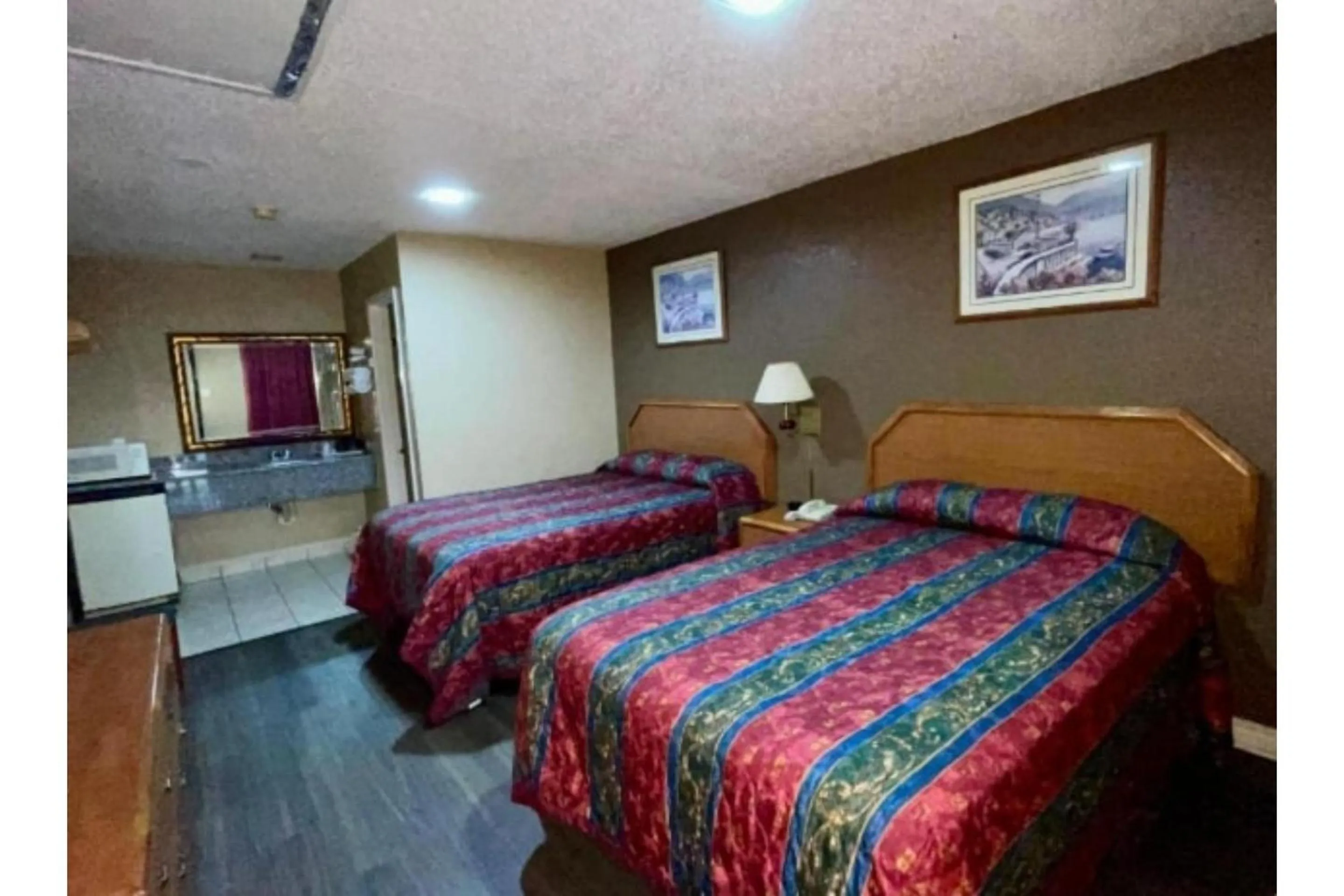 Bedroom, Bed in Golden Inn Dallas by Hotel O