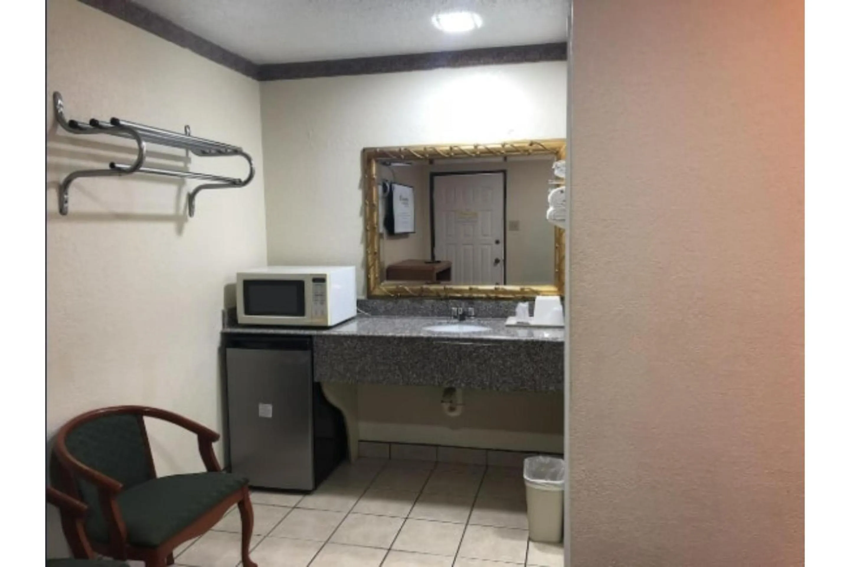 Bathroom in Golden Inn Dallas by Hotel O