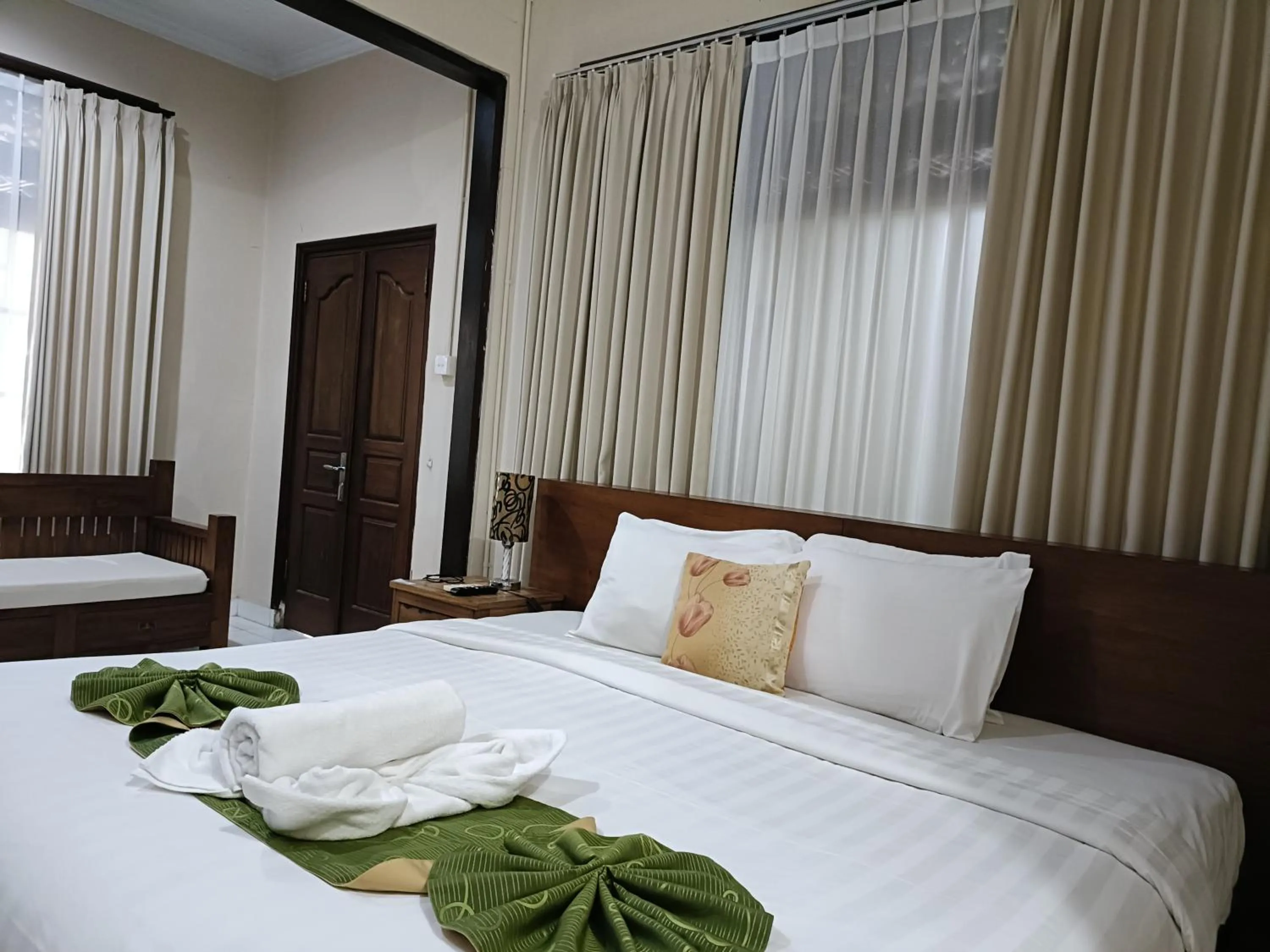 Photo of the whole room, Bed in Ngetis Home Stay