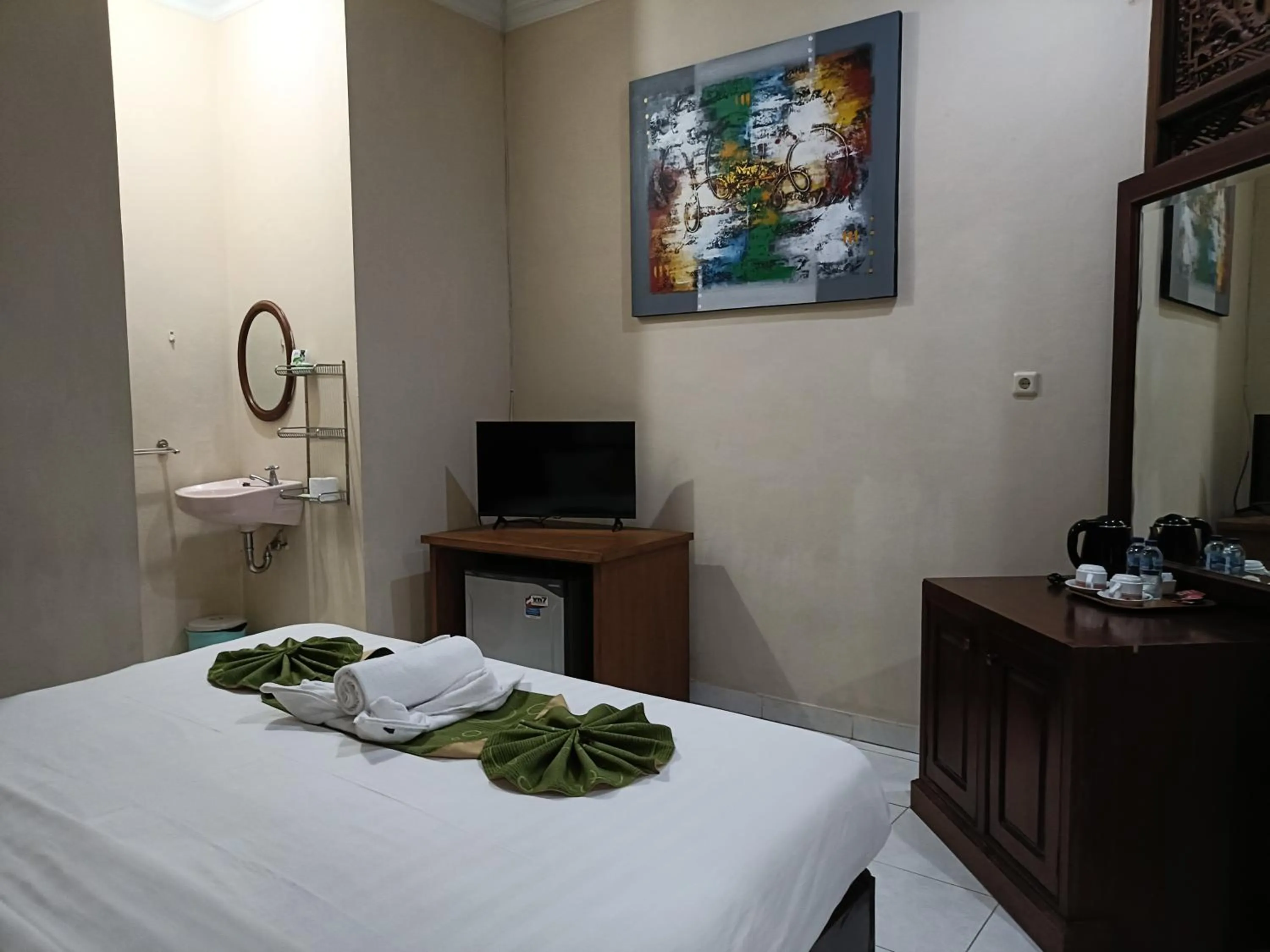 TV and multimedia, Bed in Ngetis Home Stay