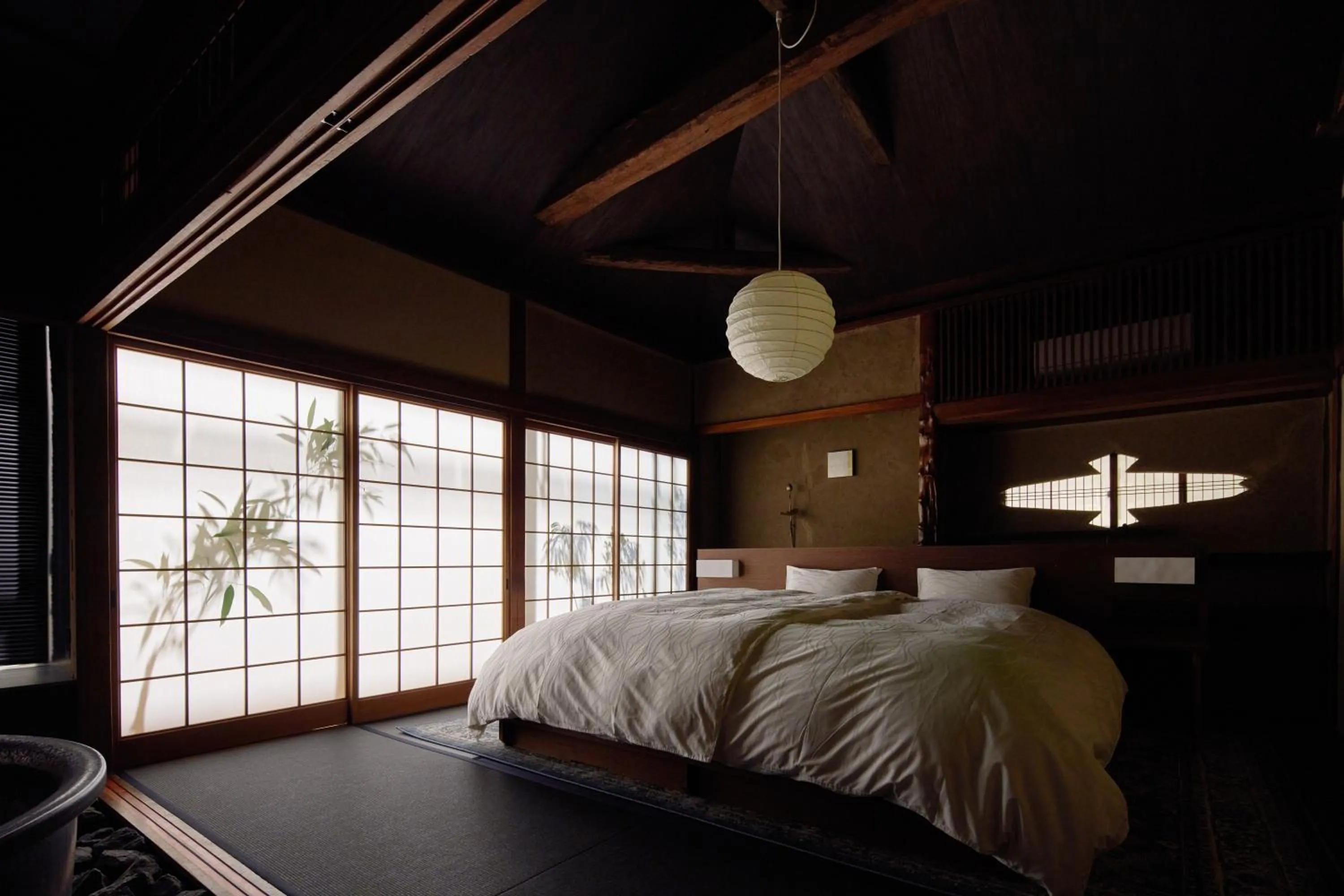 Bed in 城崎温泉 旅館 つばき乃 - Kinosaki Onsen Ryokan Tsubakino
