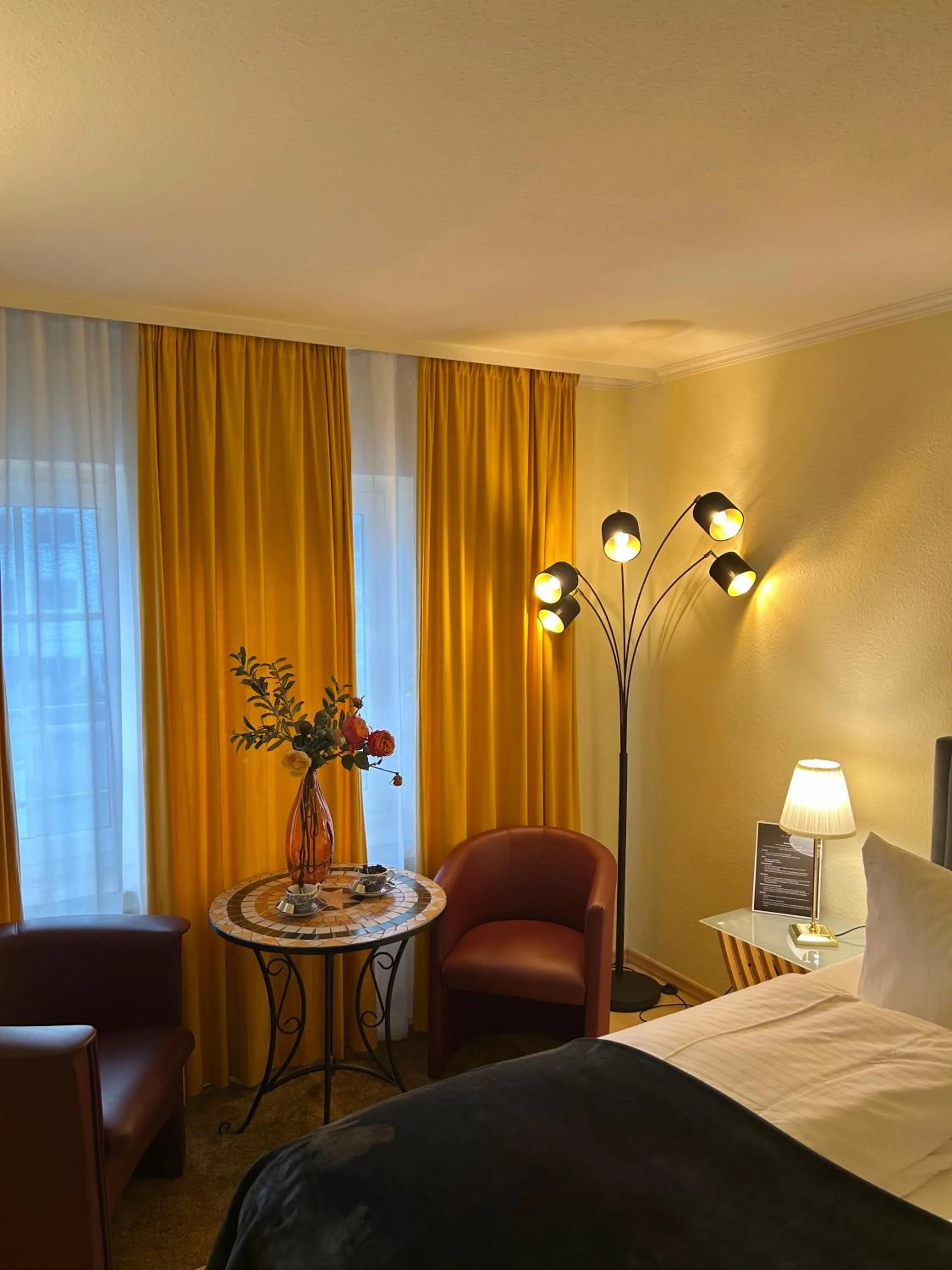 Seating area, Bed in The Soho Altstadt Relais