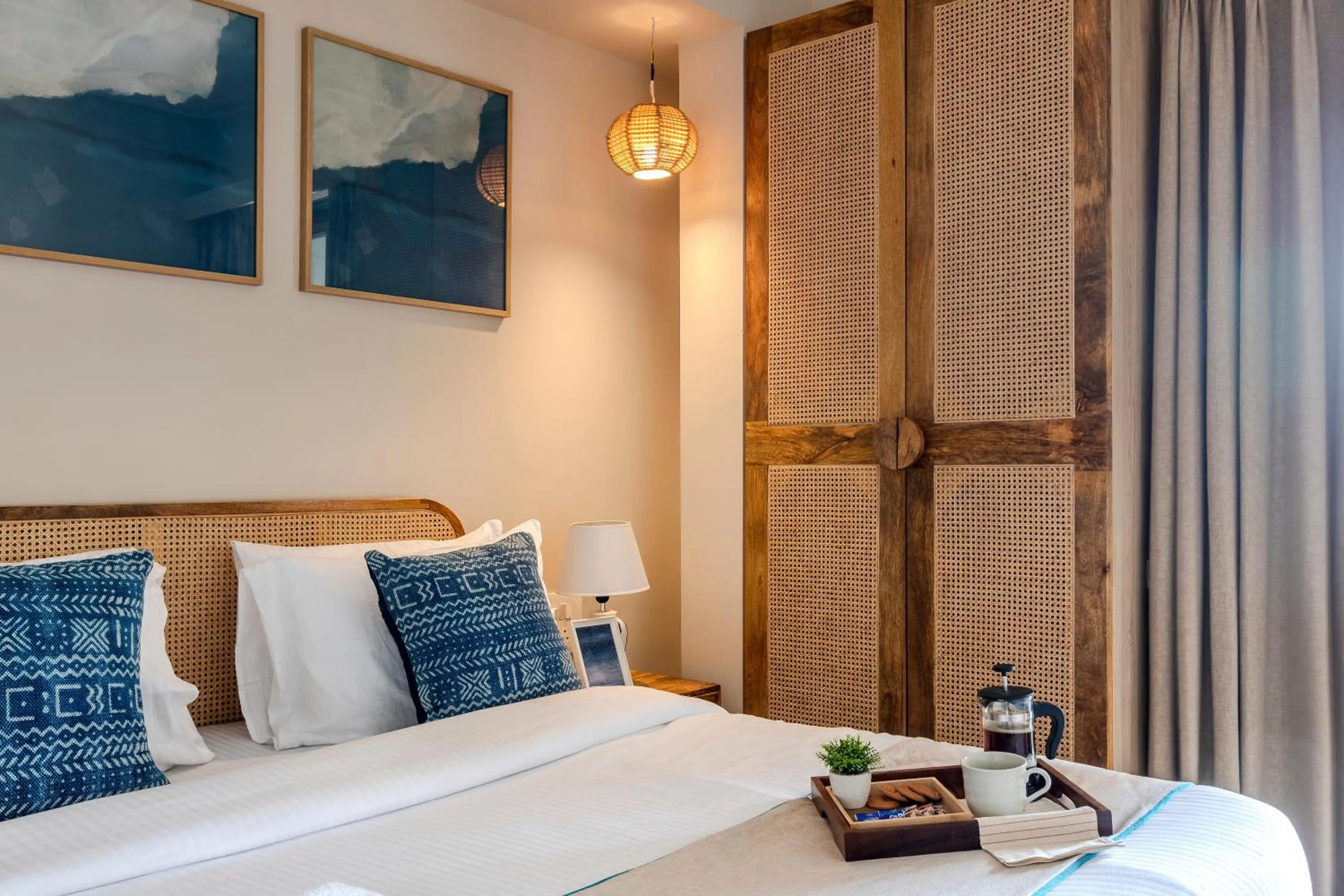 Bed in Hotel Tattva Suites