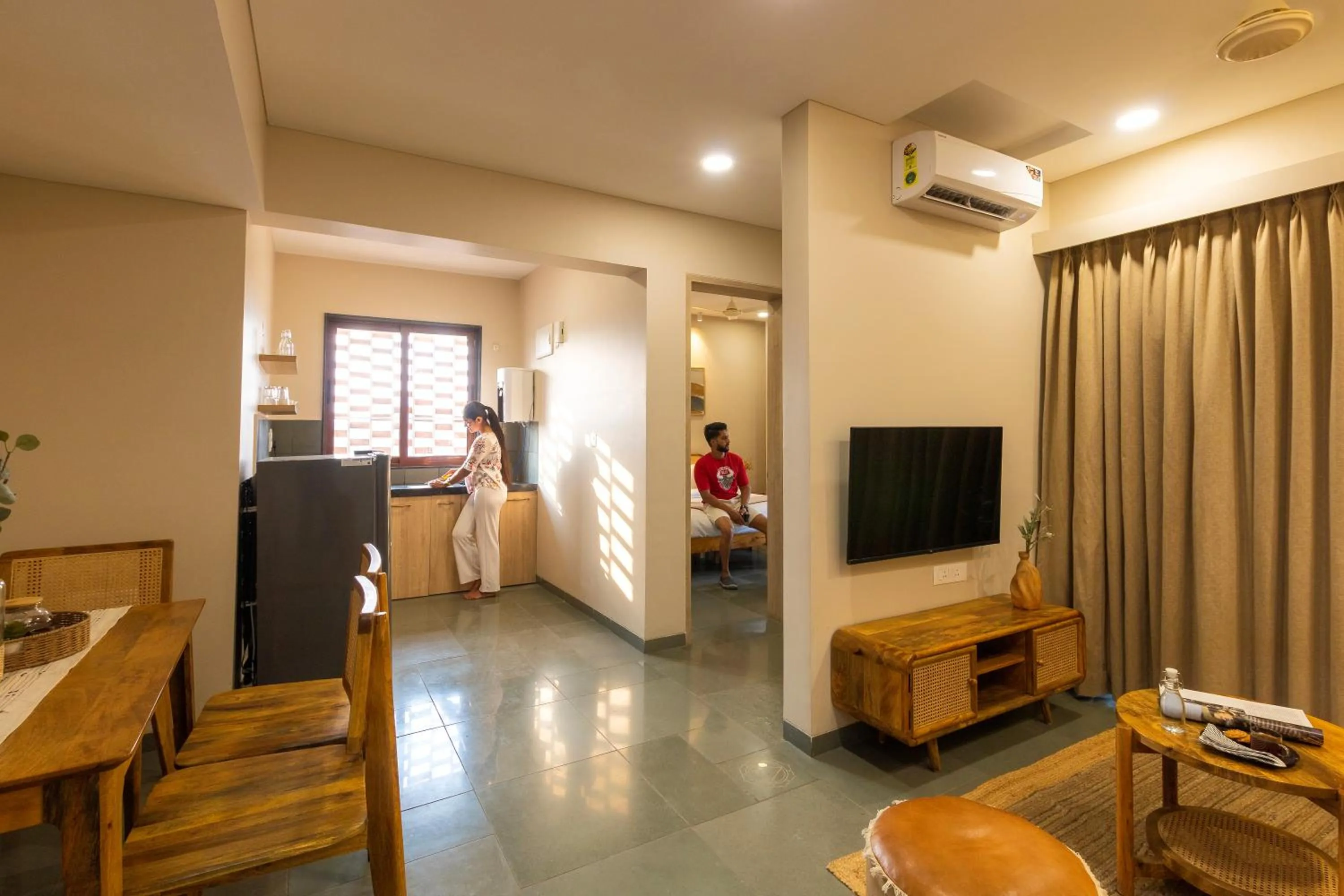 Bed, TV/Entertainment Center in Hotel Tattva Suites