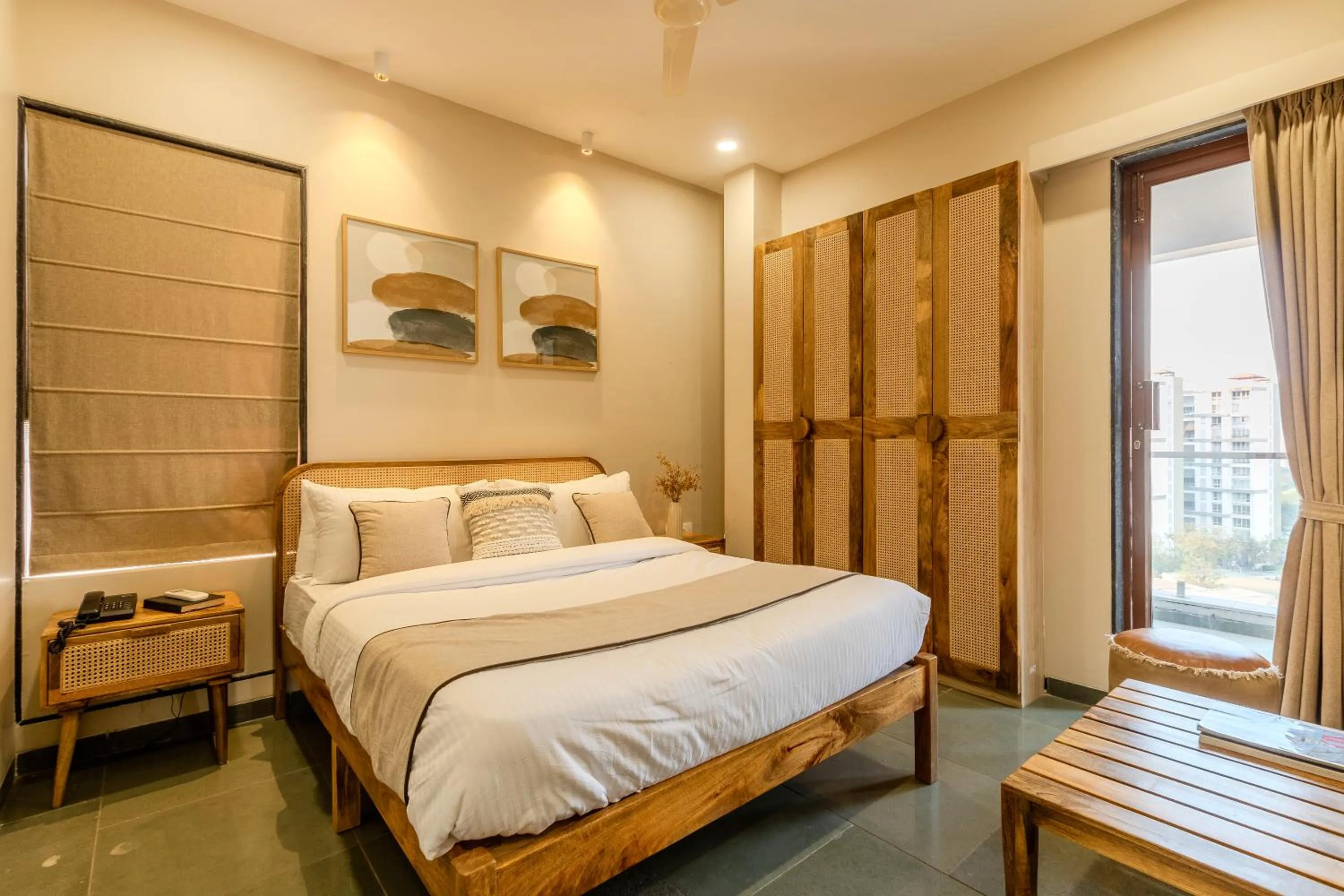 Bed in Hotel Tattva Suites