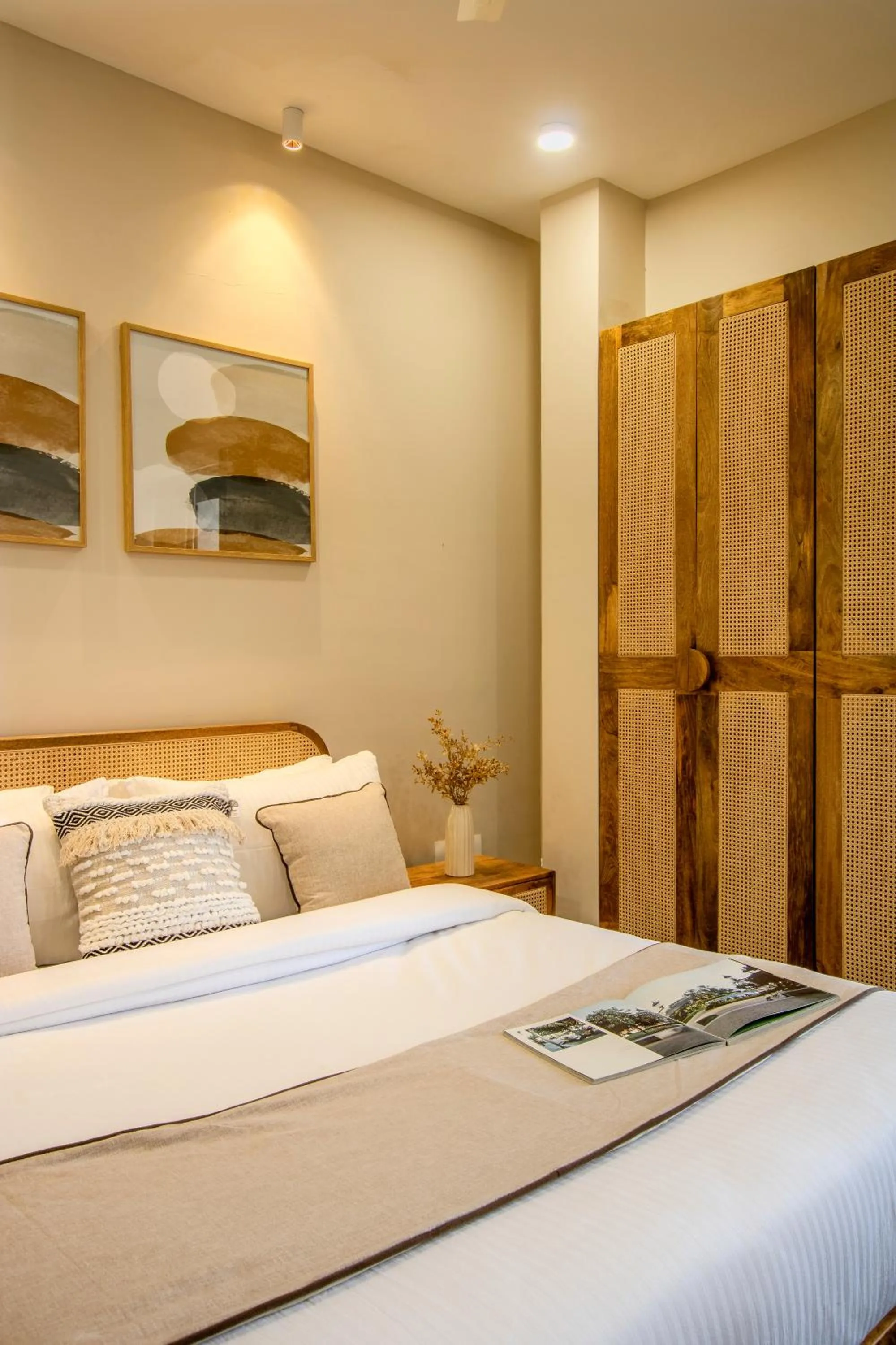 Bed in Hotel Tattva Suites