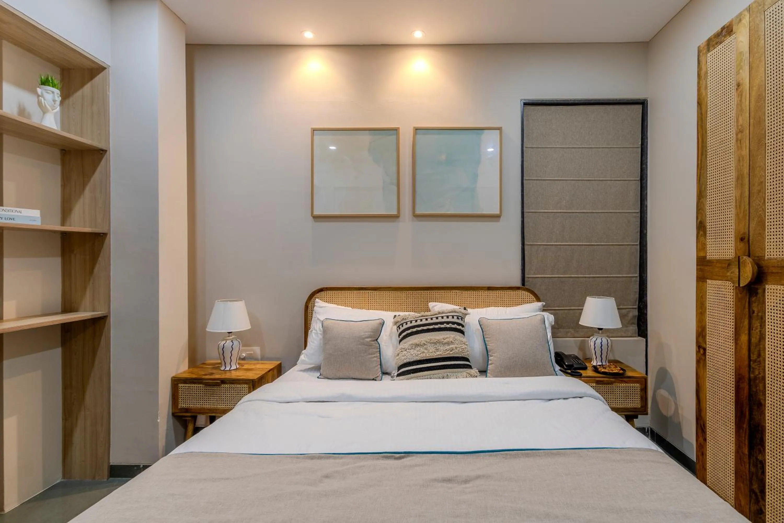 Bed in Hotel Tattva Suites