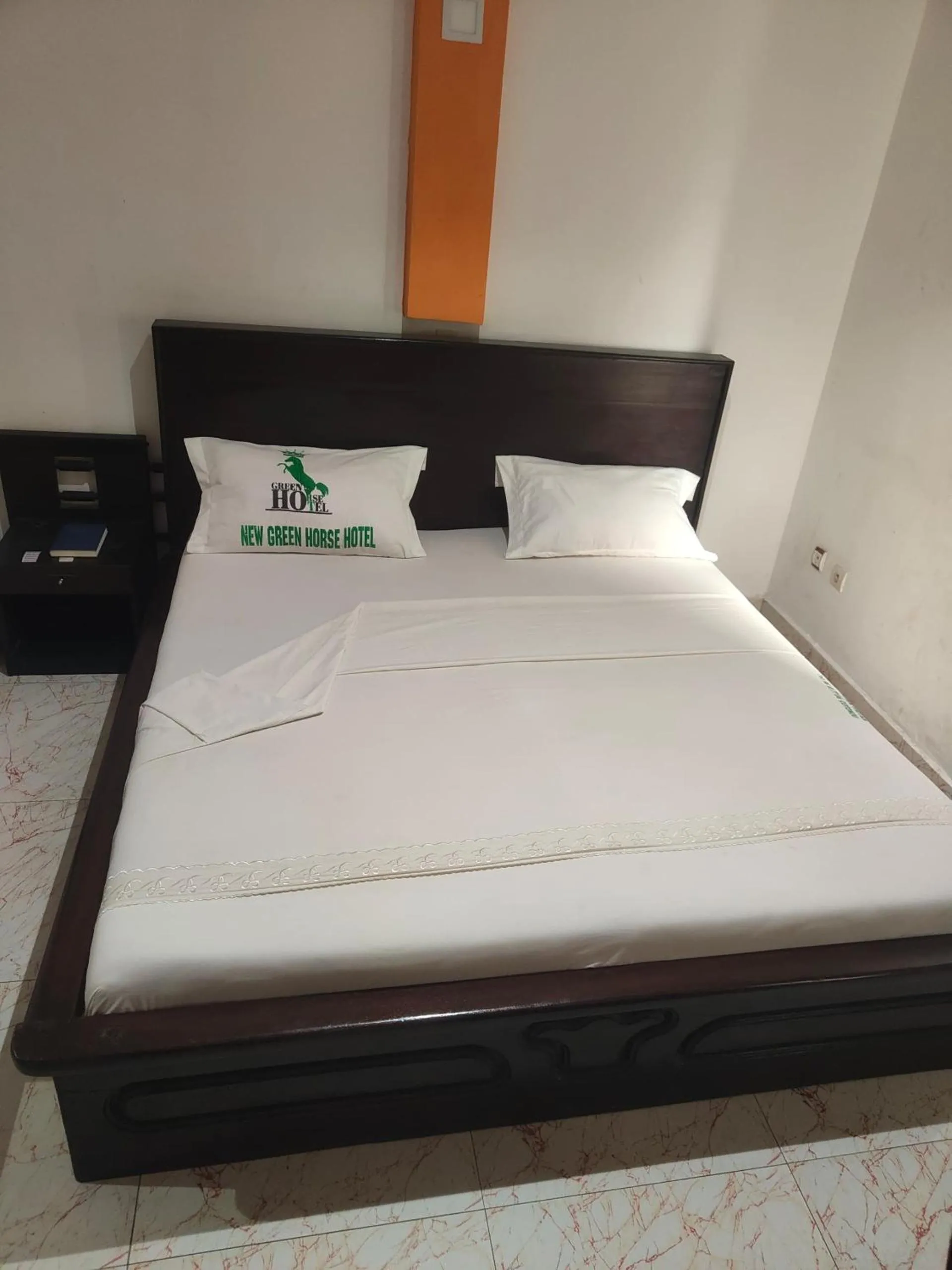 Bed in New Green Horse Hotel
