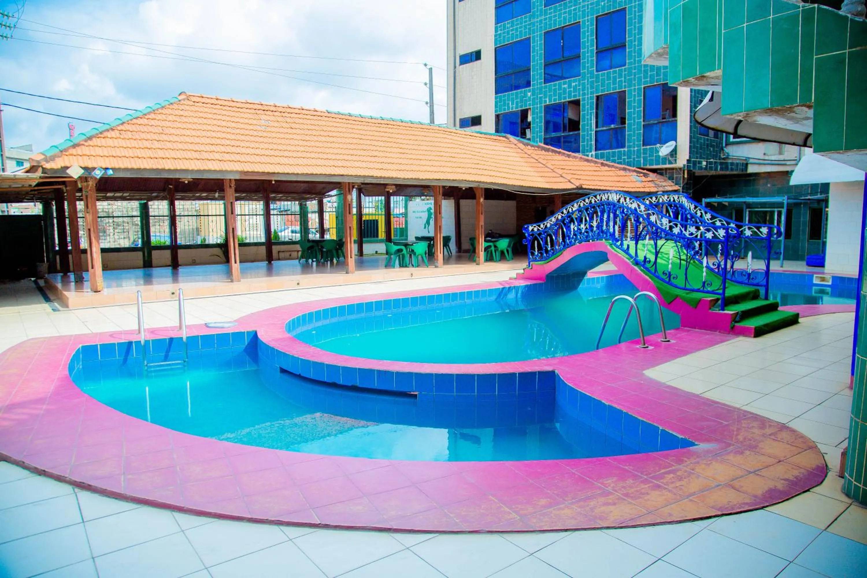 Swimming pool in New Green Horse Hotel