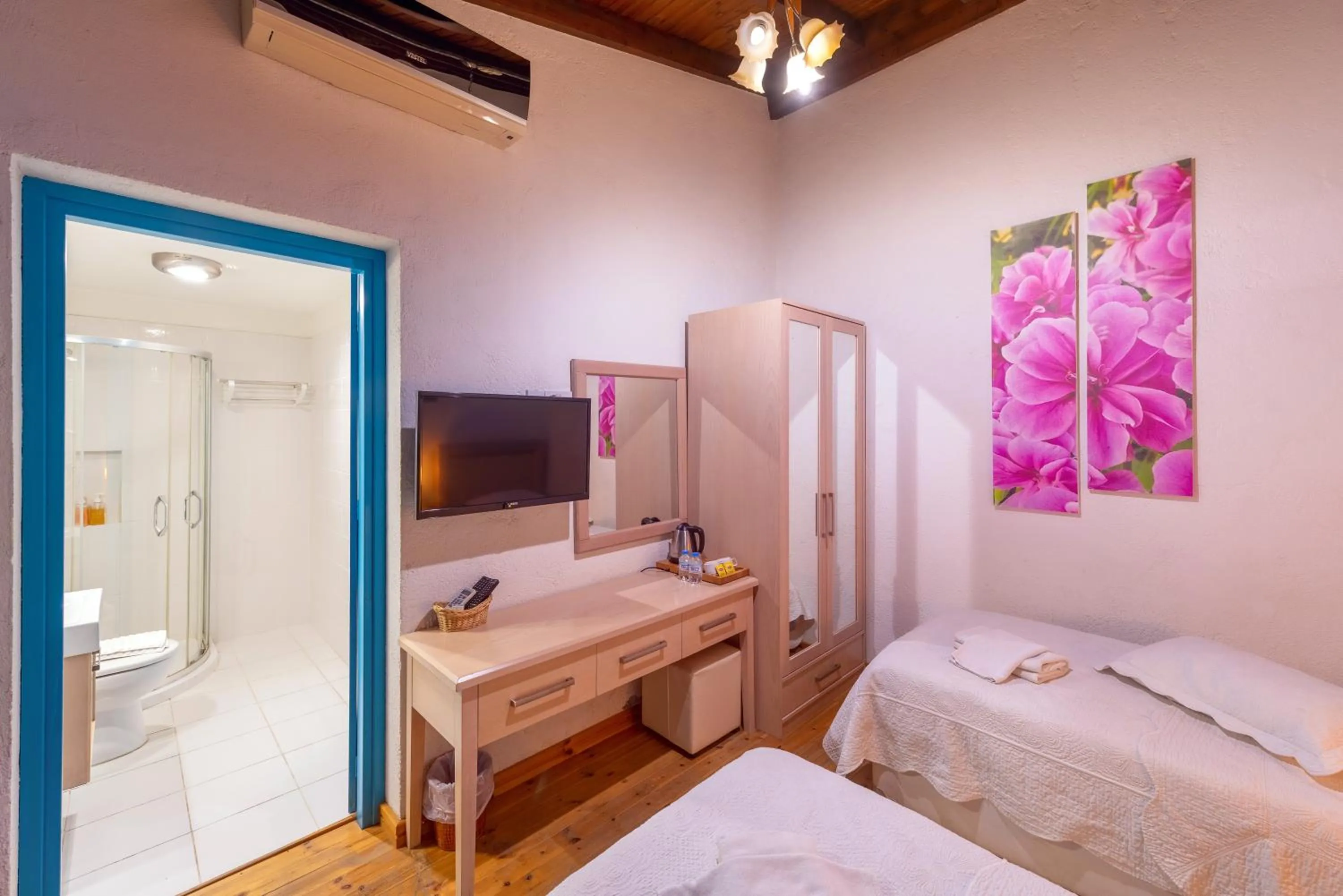 Bed in Cypriot Swallow Boutique Hotel