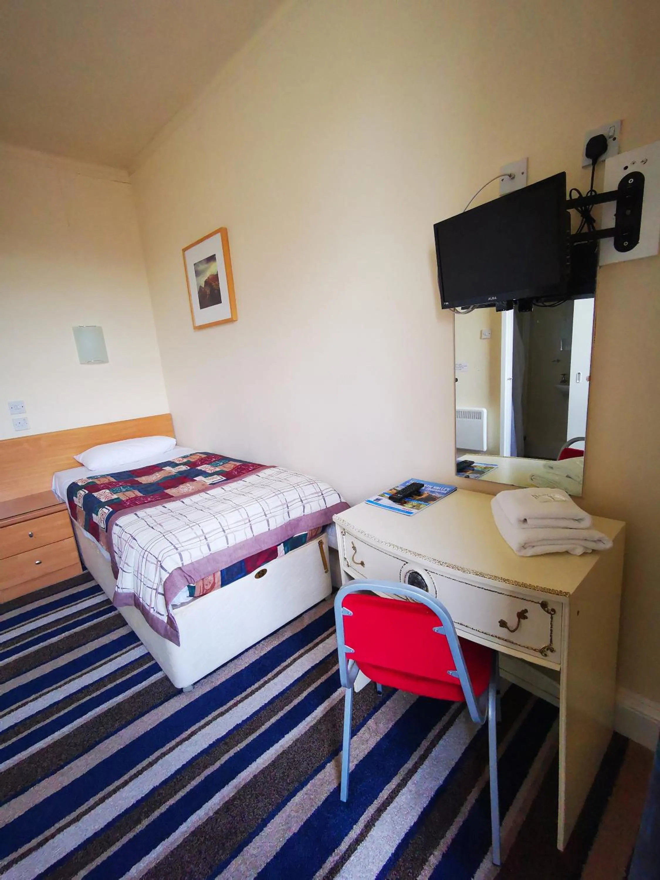 Bed in Dreadnought Hotel