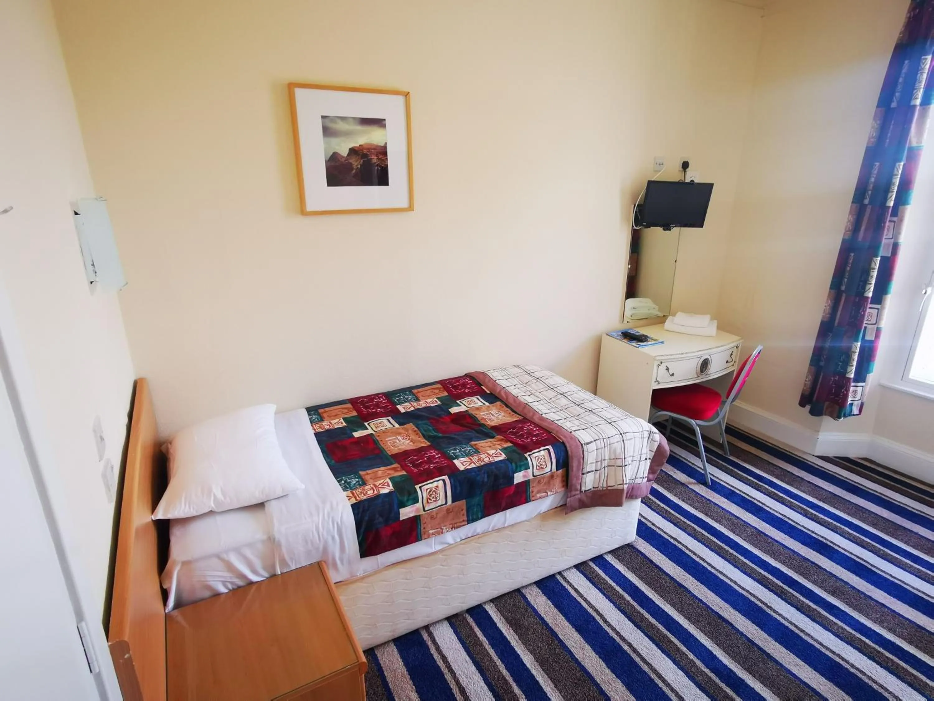 Bed in Dreadnought Hotel