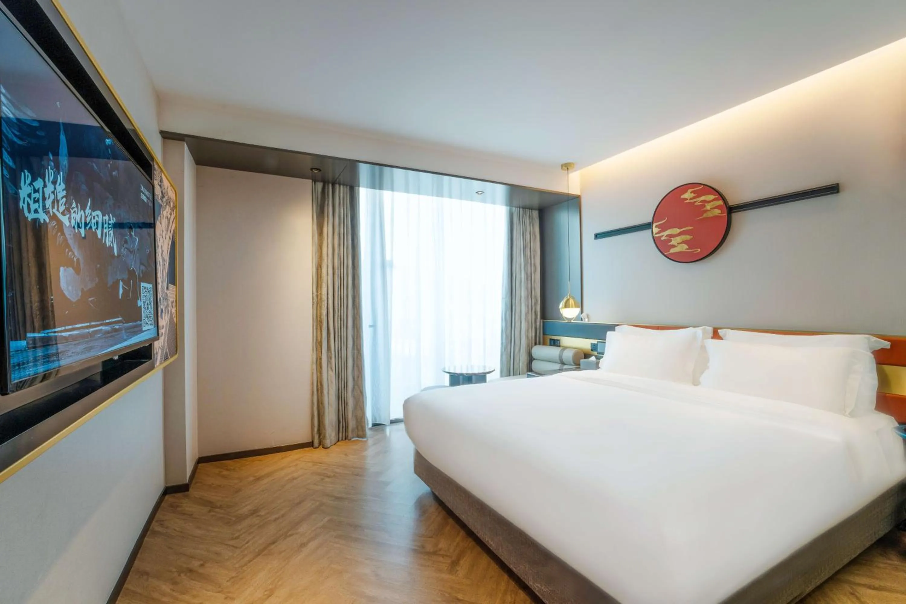 Bed in M Hotel - Beijing Tiananmen Square Qianmen Subway Station