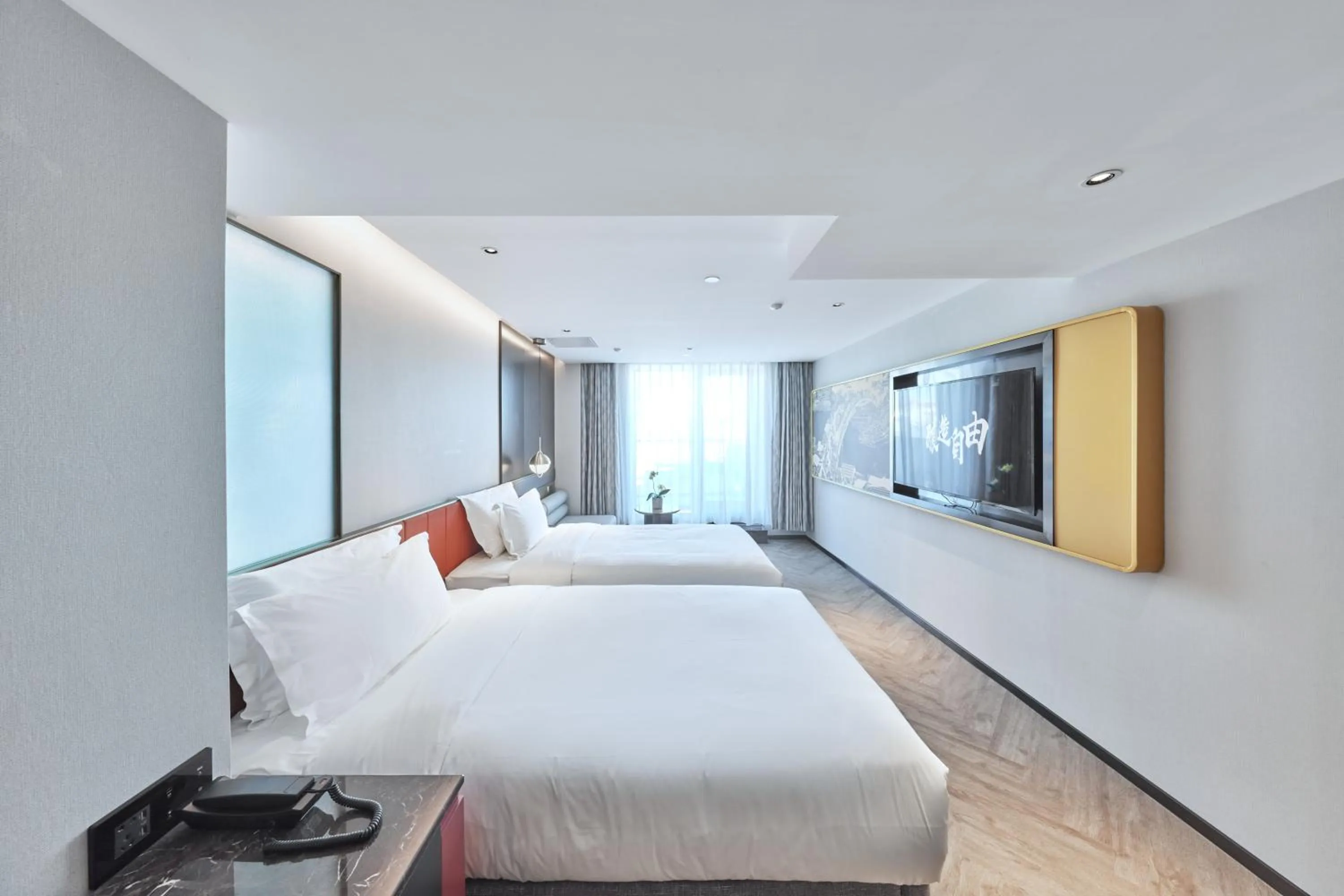 Bed in M Hotel - Beijing Tiananmen Square Qianmen Subway Station