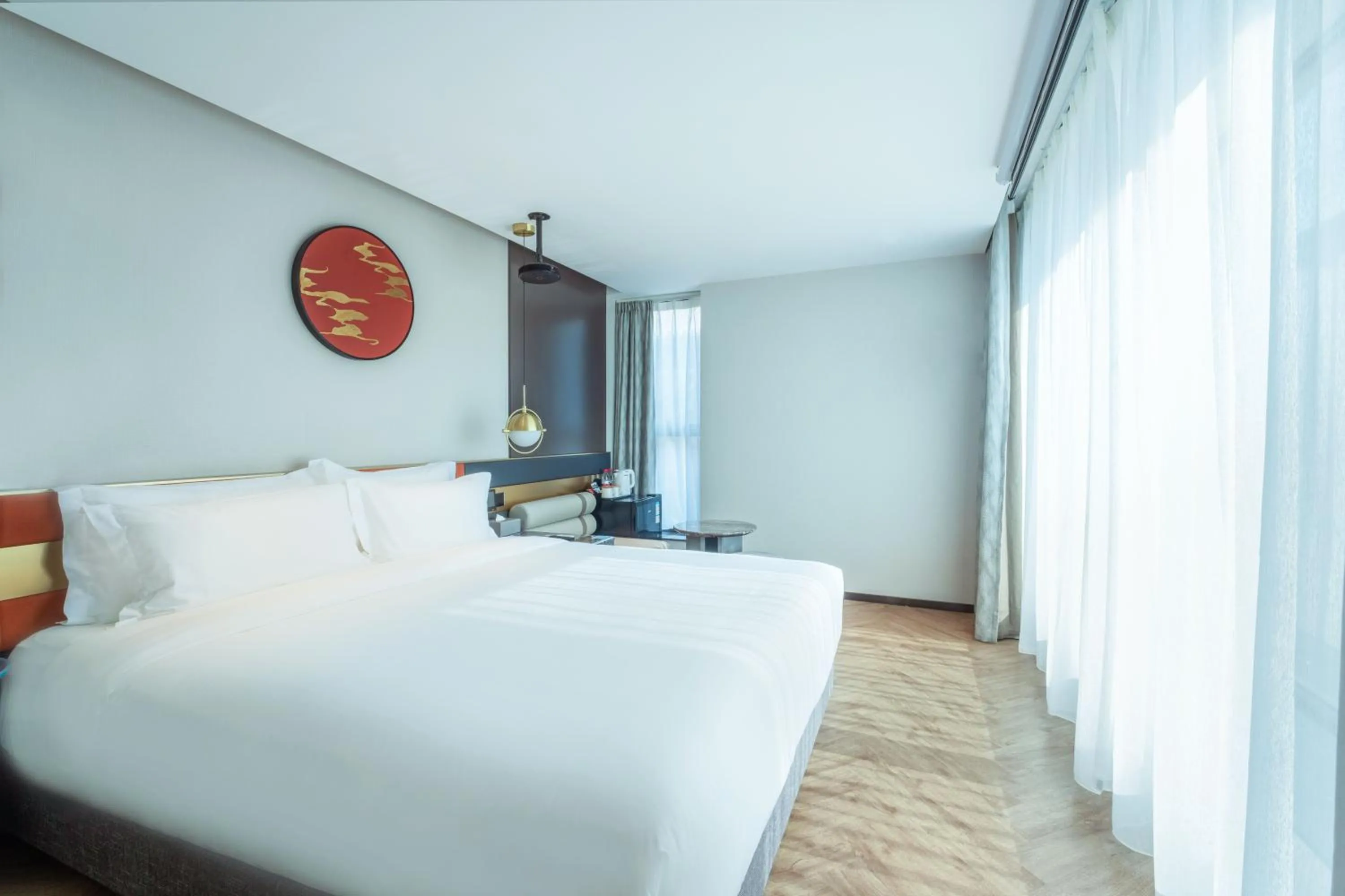 Bed in M Hotel - Beijing Tiananmen Square Qianmen Subway Station