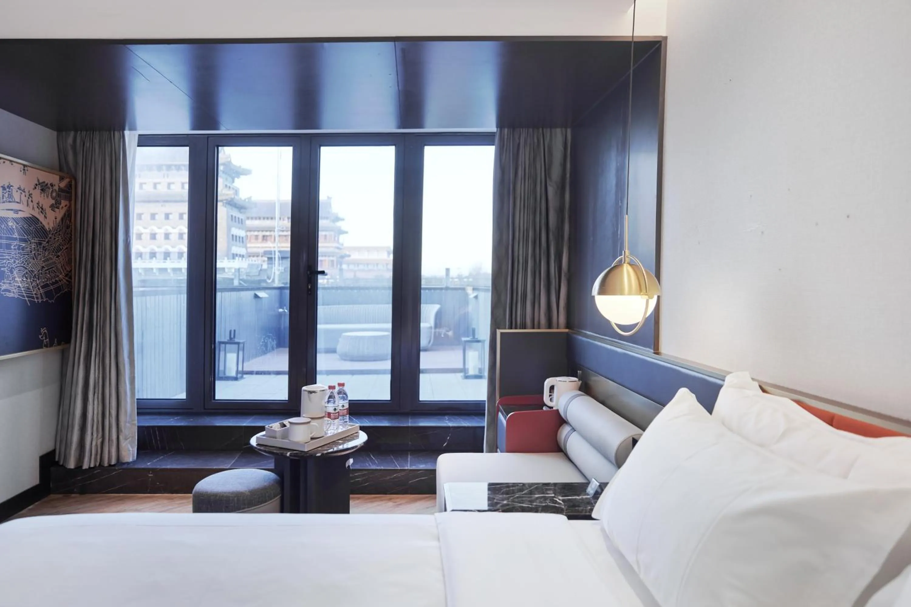 Bed in M Hotel - Beijing Tiananmen Square Qianmen Subway Station