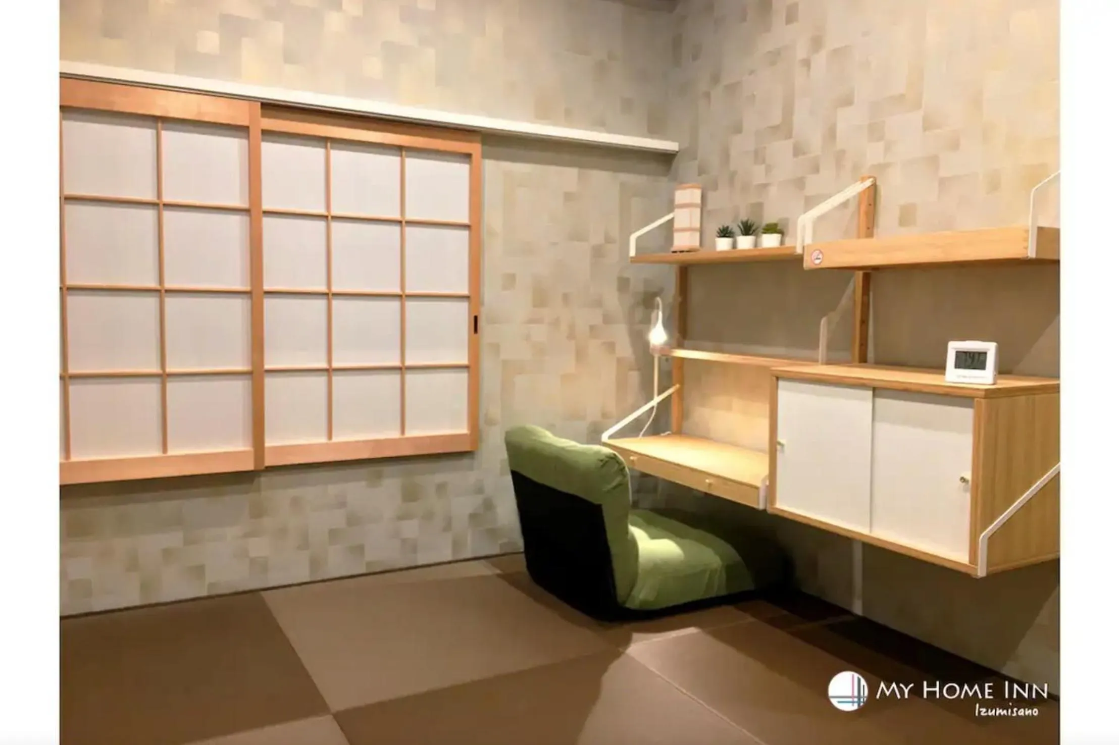 Seating area in My Home Inn Izumisano