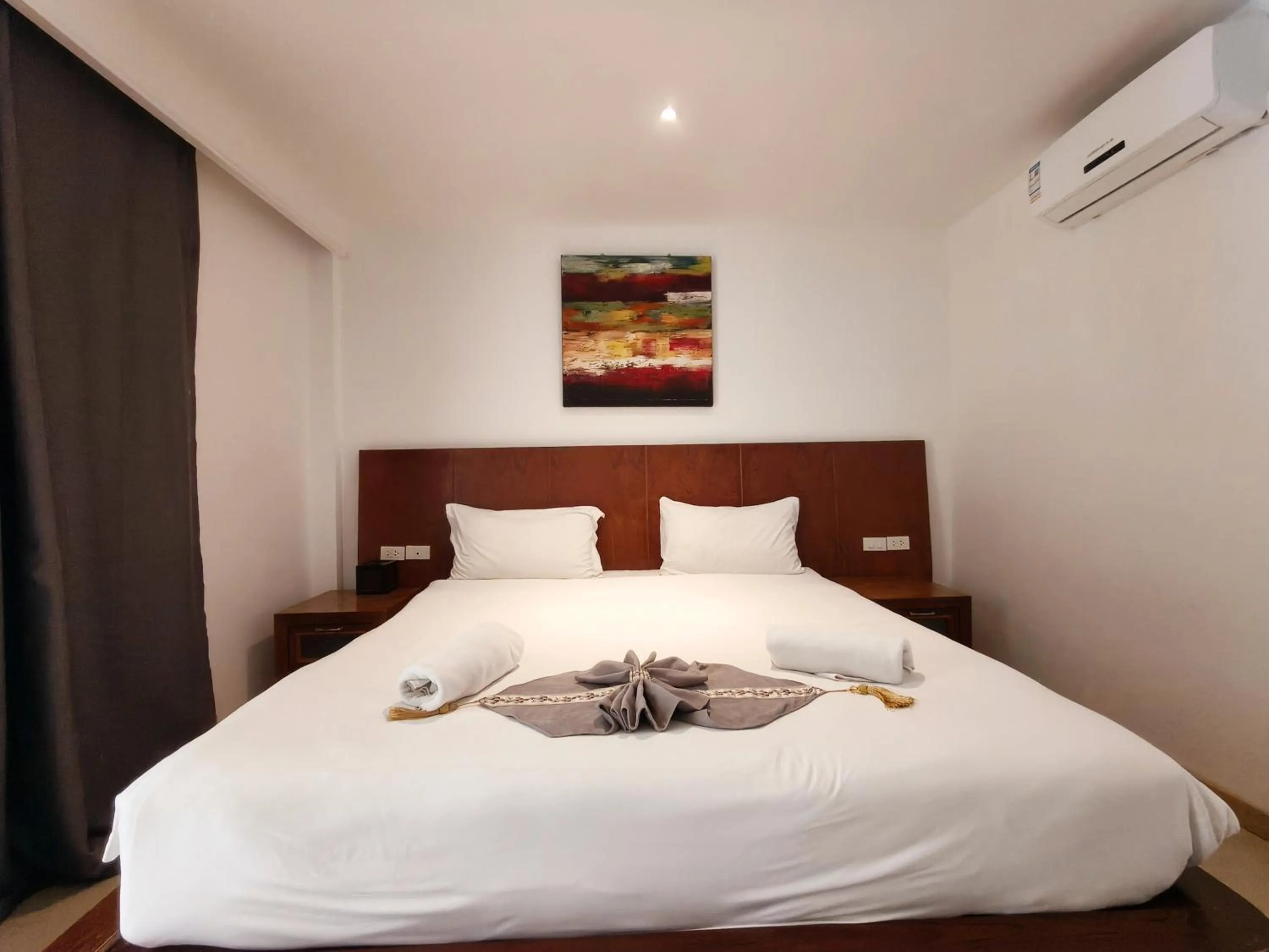 Bed in V Beach Resort