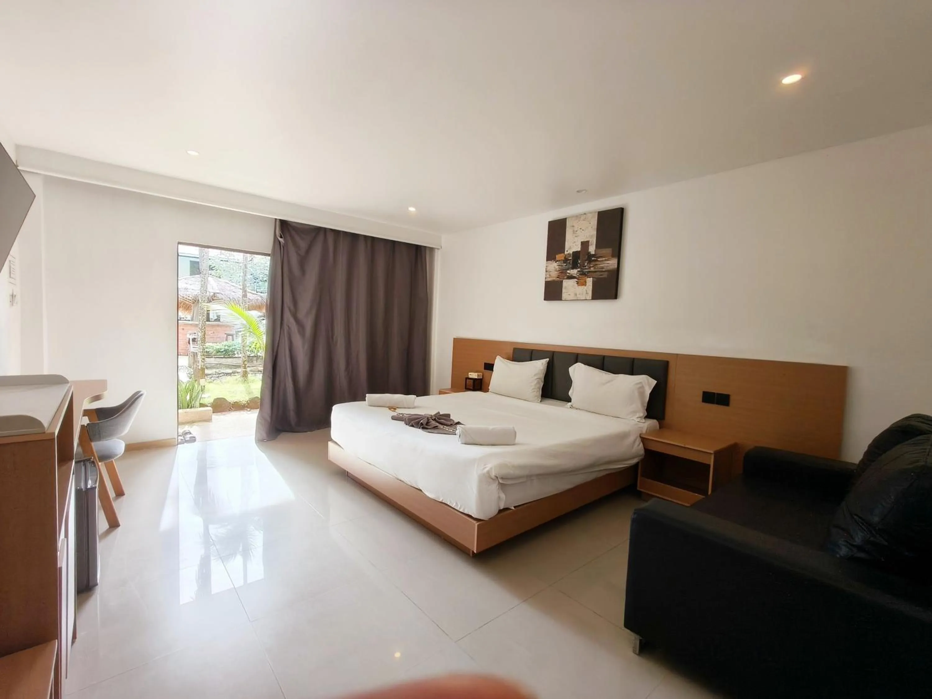 Photo of the whole room, Bed in V Beach Resort