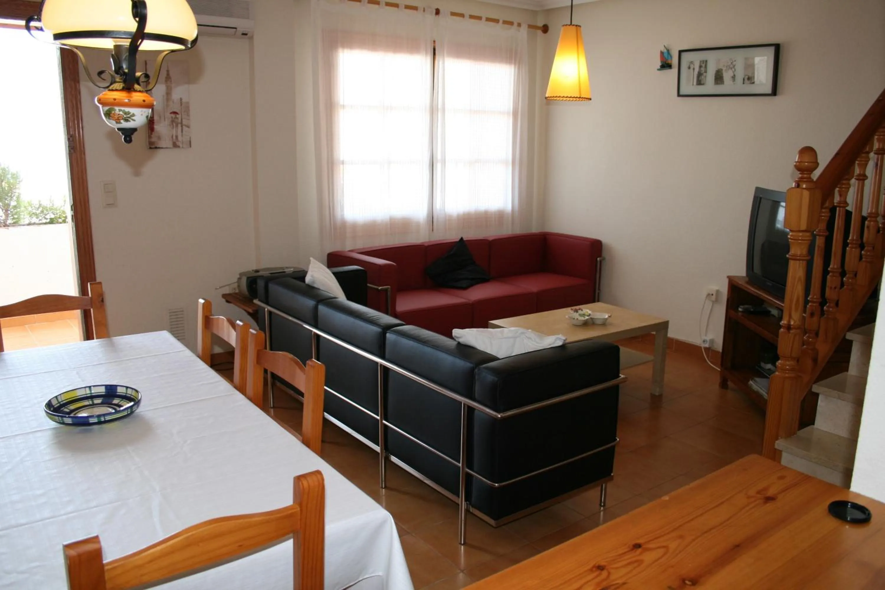 Communal lounge/ TV room in Bungalow Mediterraneo