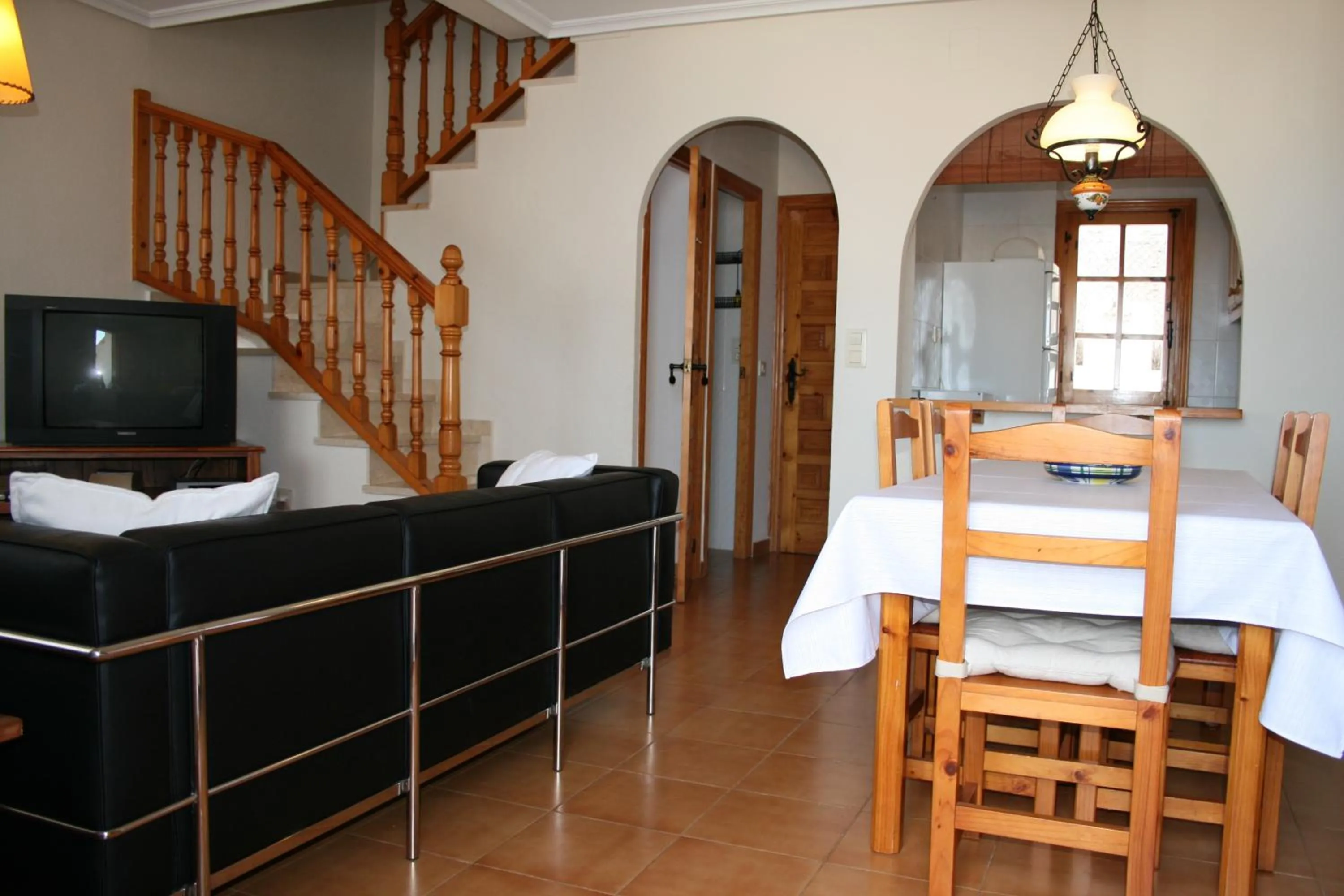 Communal lounge/ TV room in Bungalow Mediterraneo