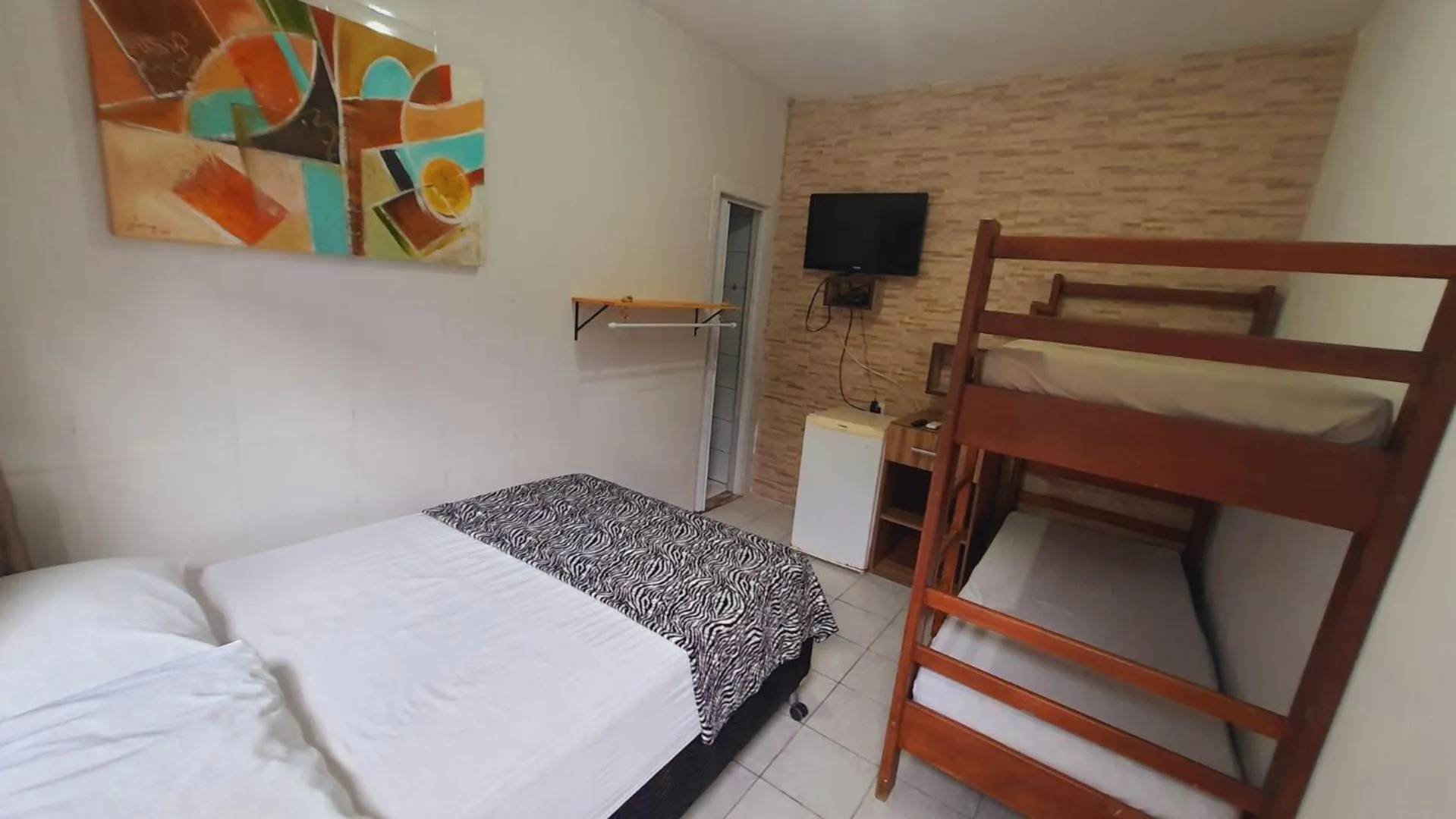 Bed in Open House Canasvieiras - OH HOTÉIS