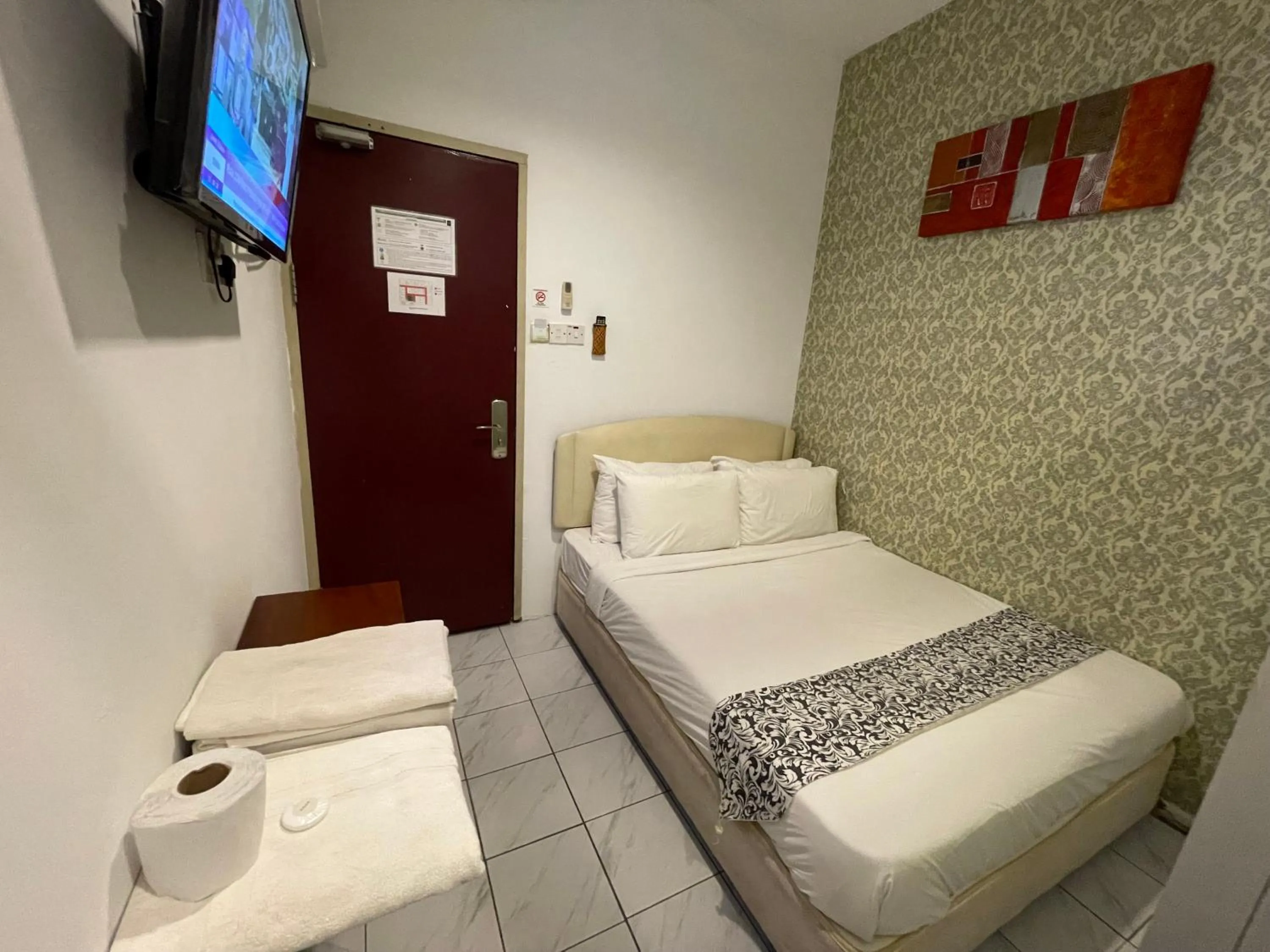 Bed in Woodpecker Lodge, Kuching