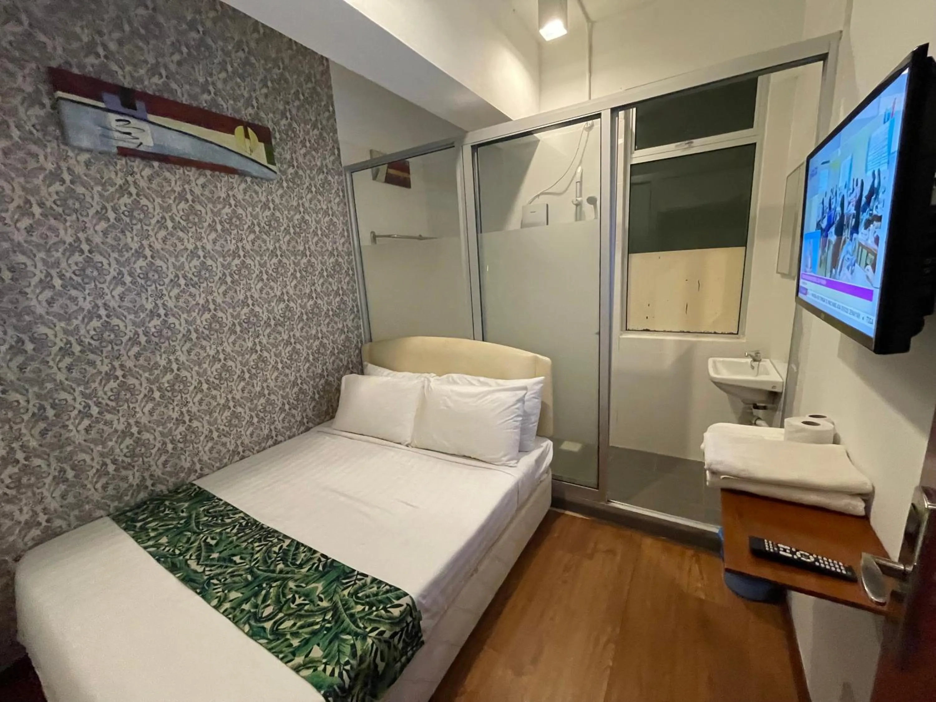 Bed in Woodpecker Lodge, Kuching