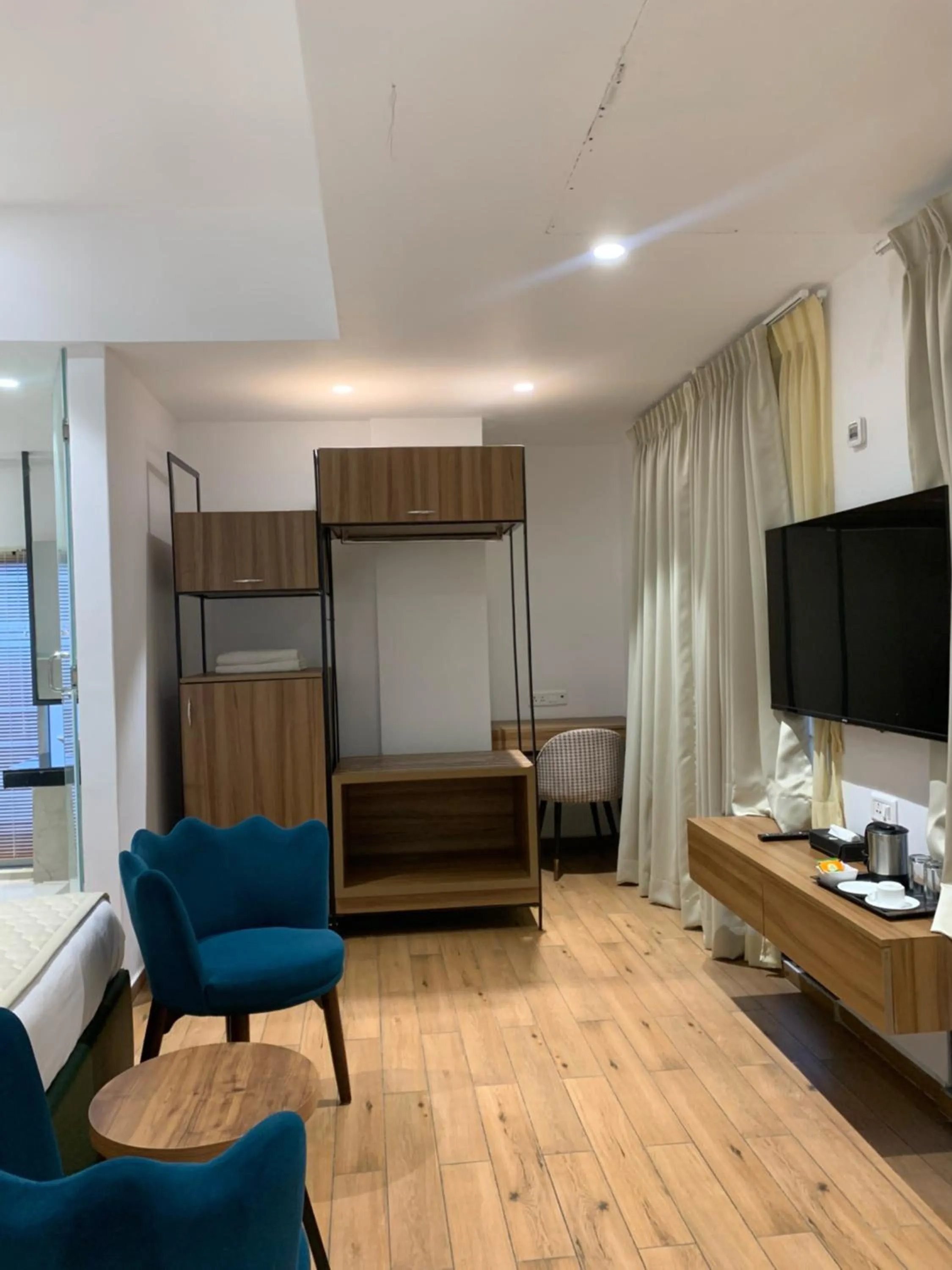 Photo of the whole room in Pondy Heights - Suites and Studios