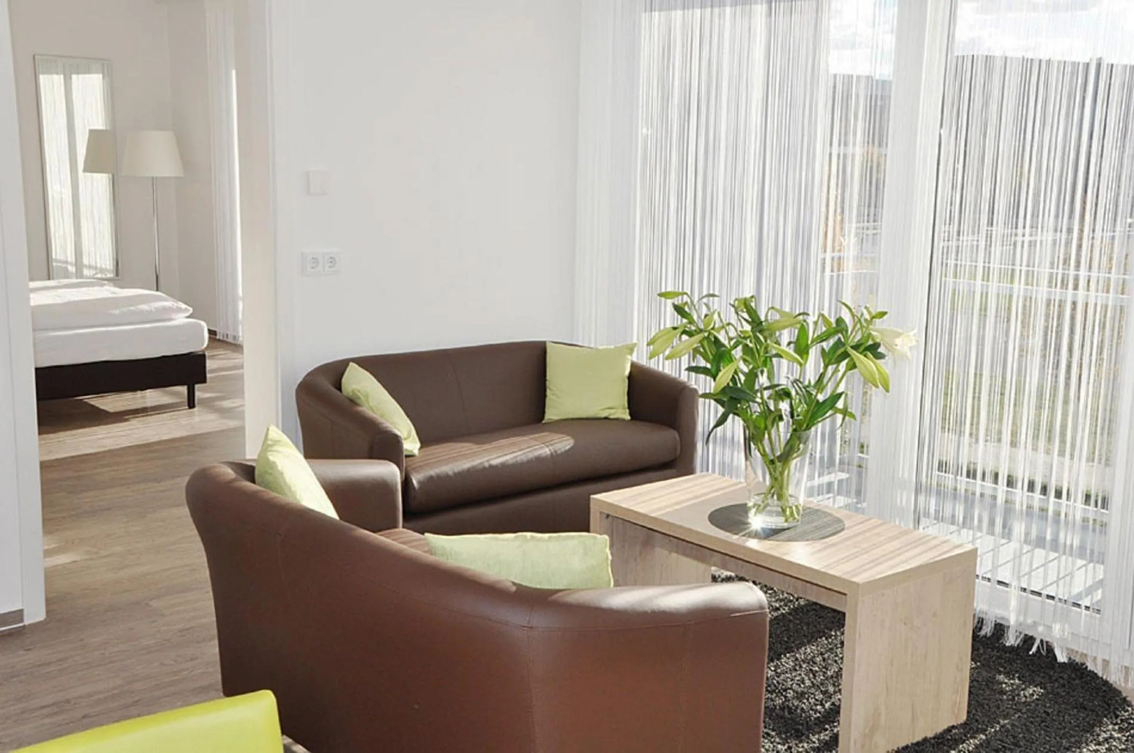 Living room, Bed in ADAPT APARTMENT HOTEL BERLIN - Adlershof