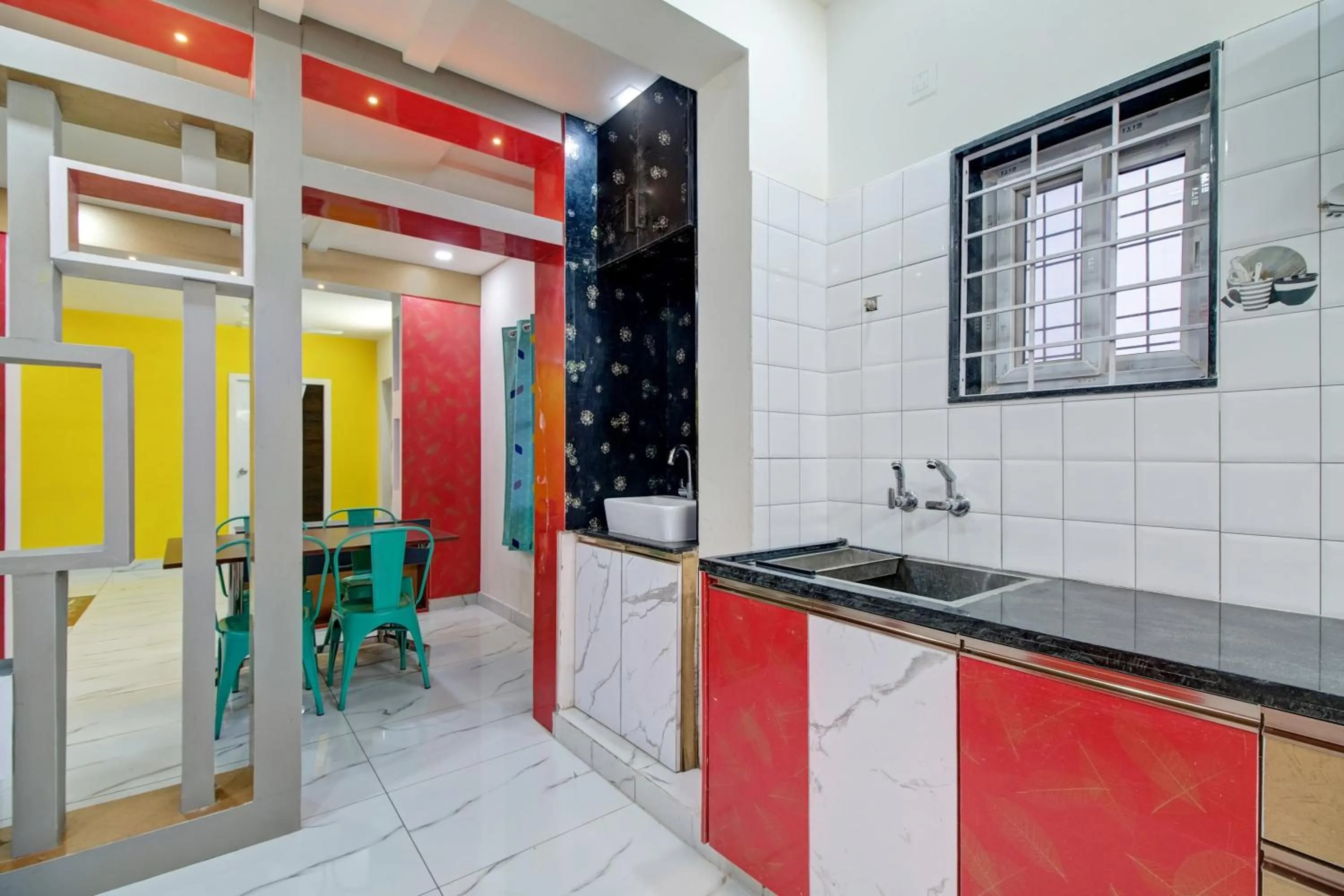 Kitchen or kitchenette in Hotel O Amaravathi Road Annapurna Nagar