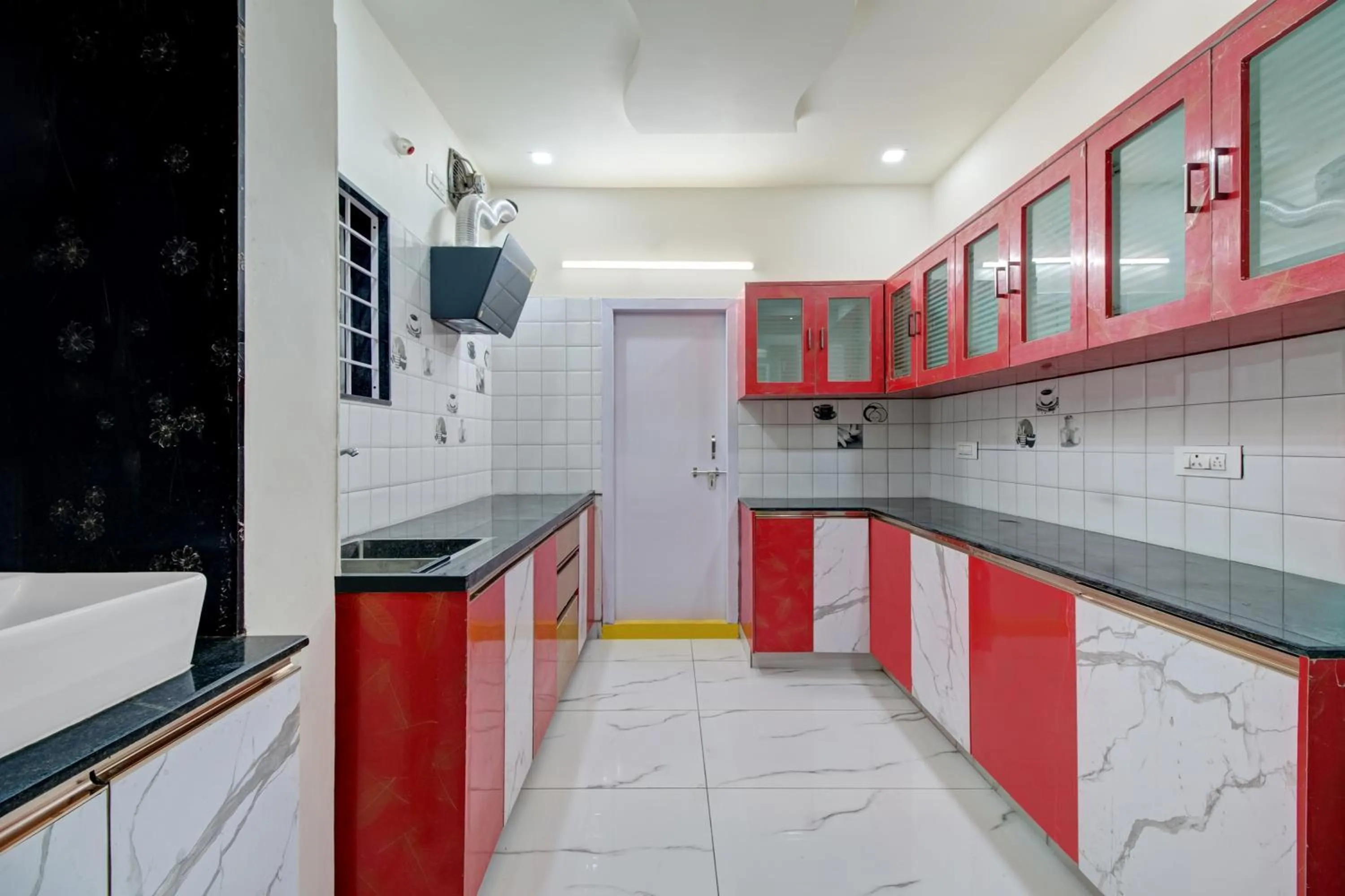 Kitchen or kitchenette in Hotel O Amaravathi Road Annapurna Nagar