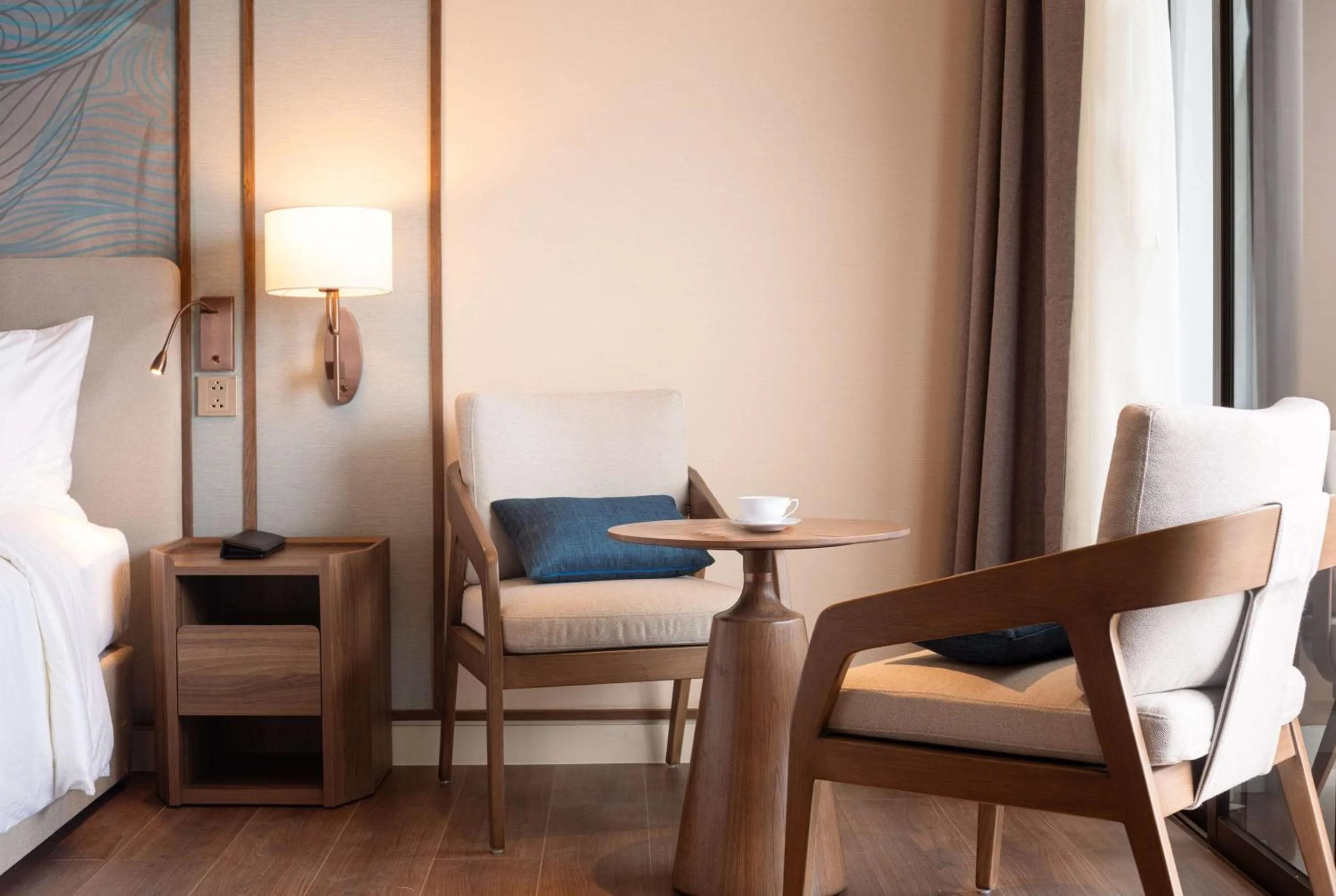 Photo of the whole room, Bed in Wyndham Garden Sonasea Van Don