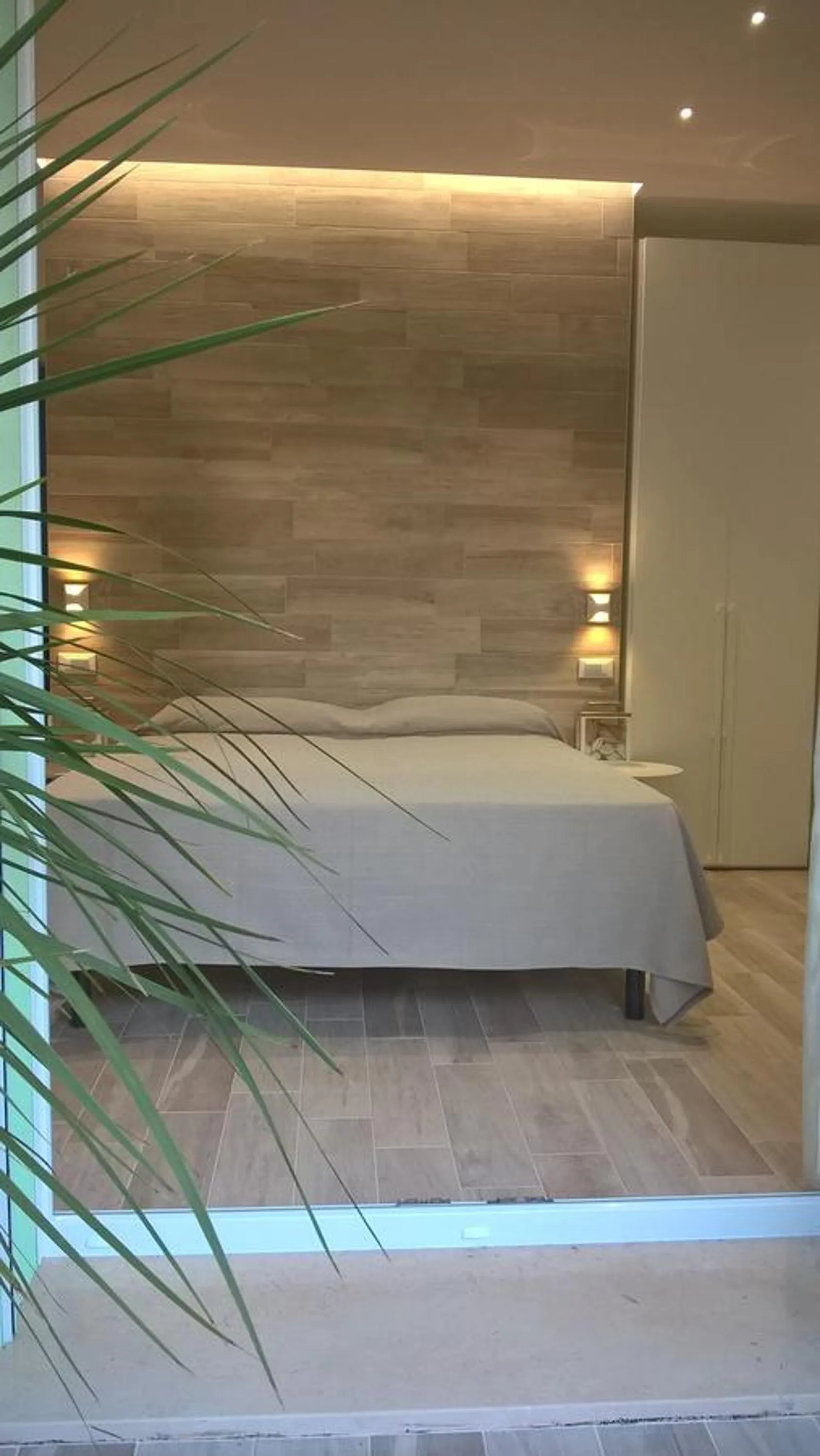 Photo of the whole room, Bed in Residence Diffuso Arcobaleno