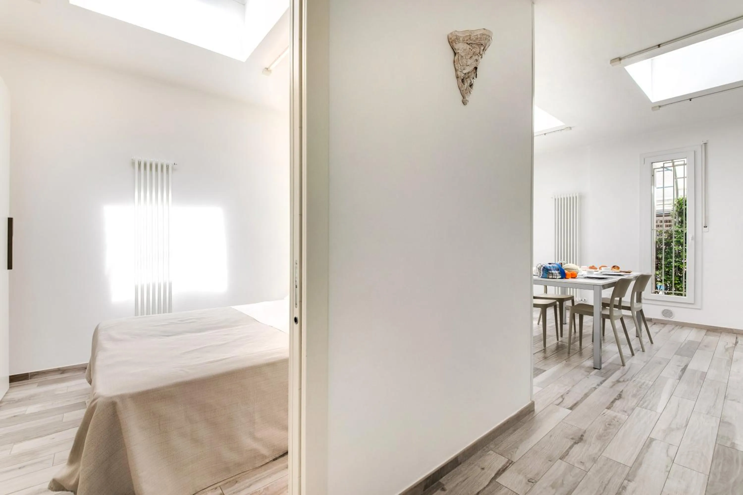 Living room, Bed in Residence Diffuso Arcobaleno