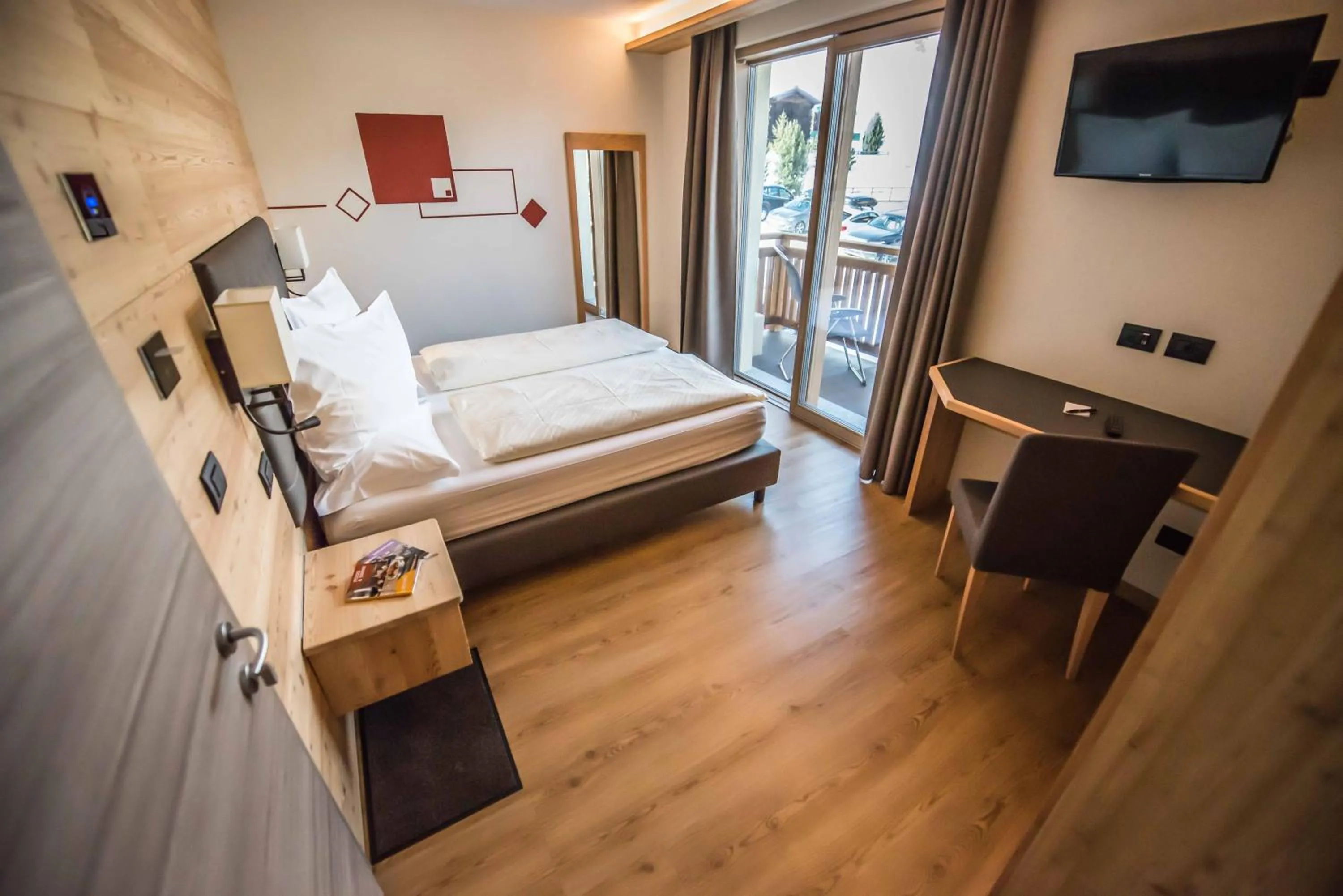 Bed in Hotel Le Alpi