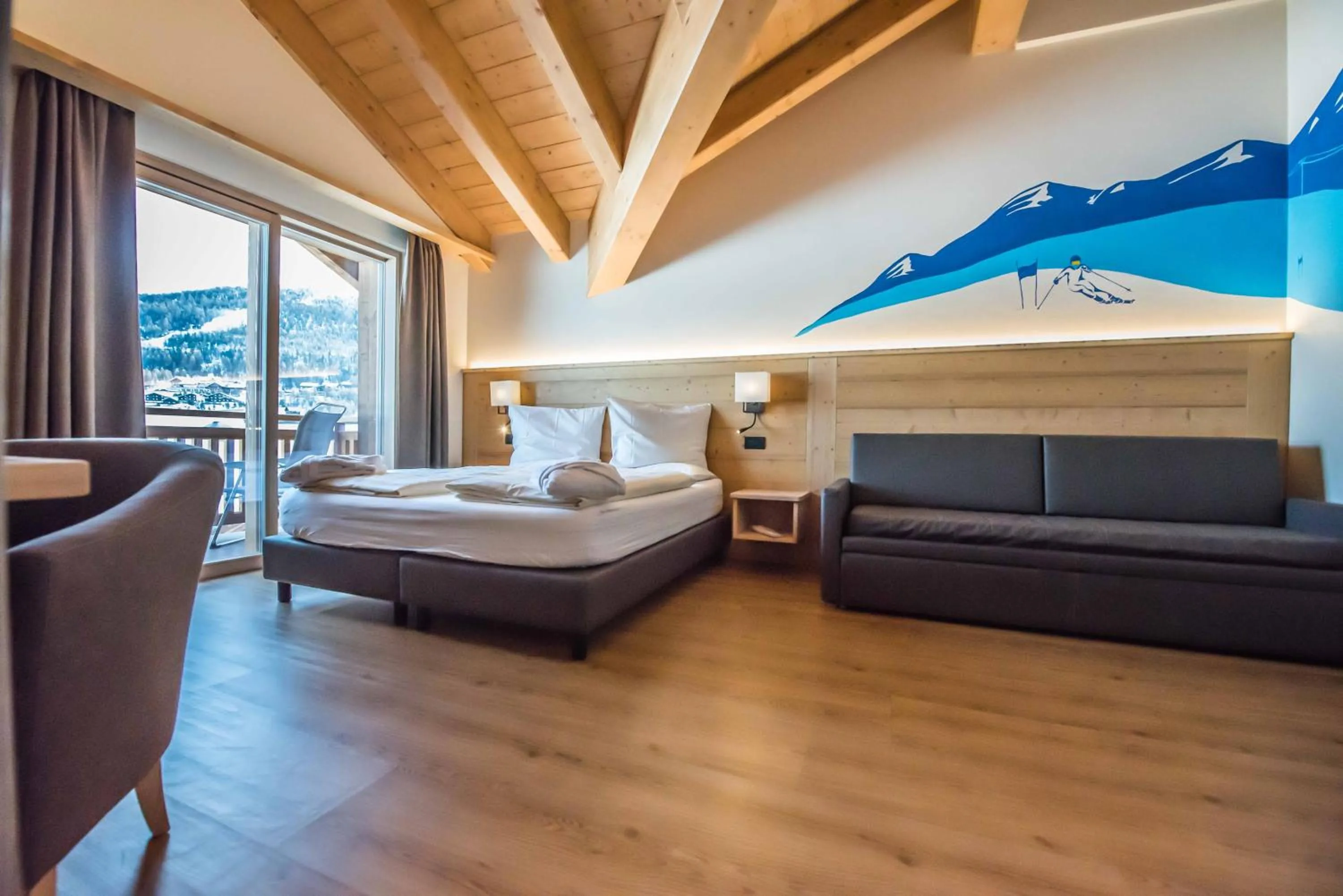 Bed in Hotel Le Alpi