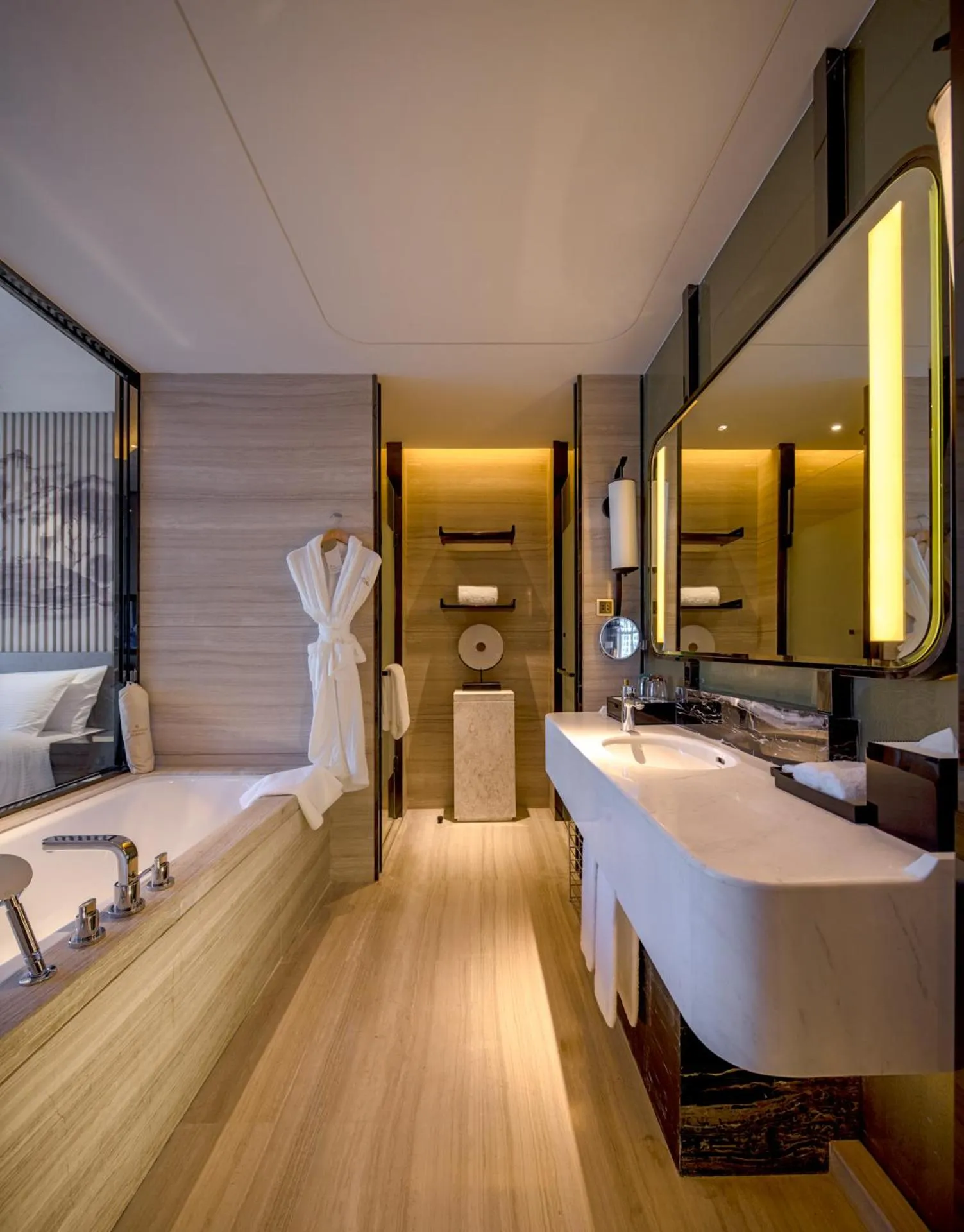 Toilet, Bed in Wanda Realm Hotel Wuhu