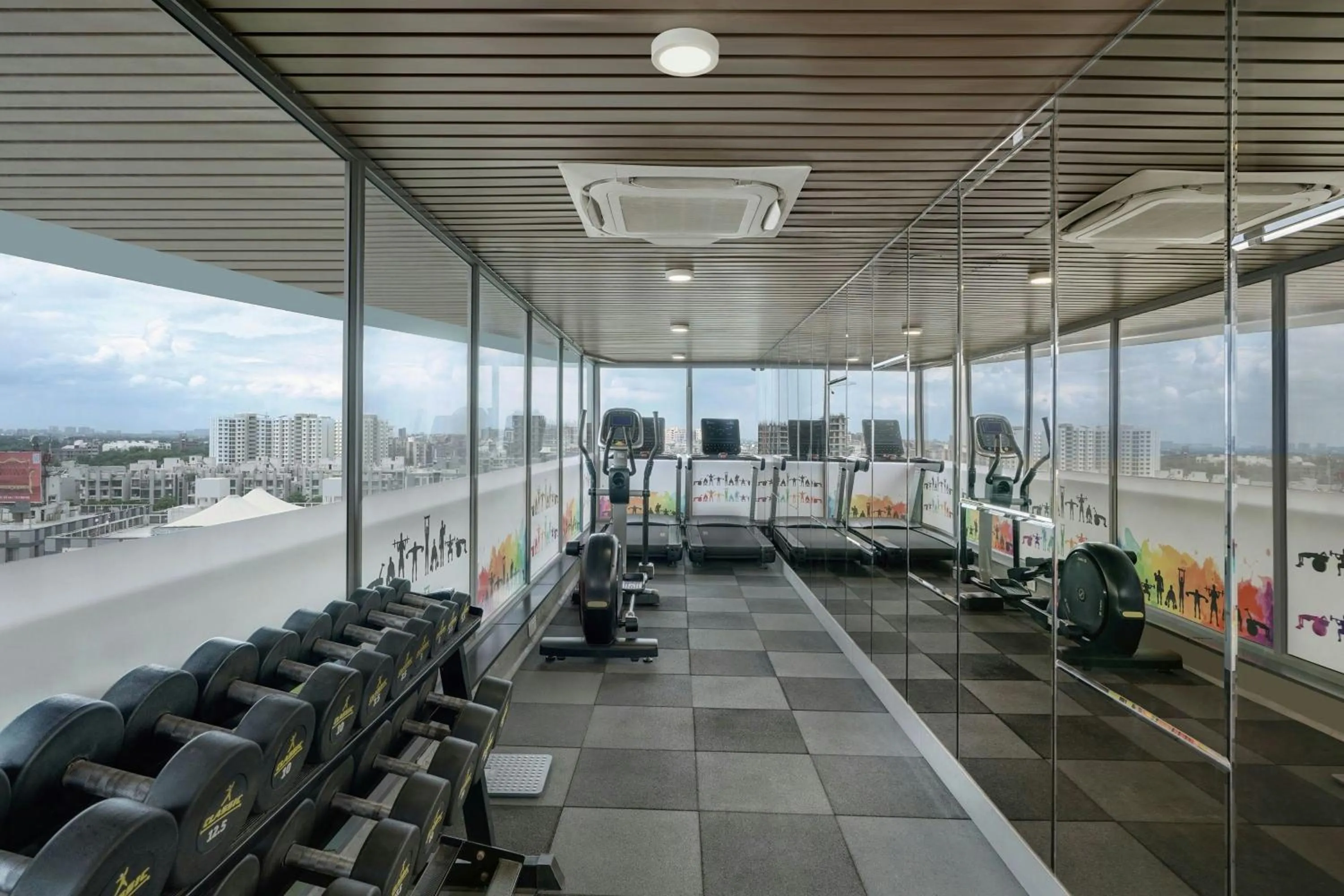 Fitness centre/facilities in The Fern Residency, Gandhinagar, Series by Marriott