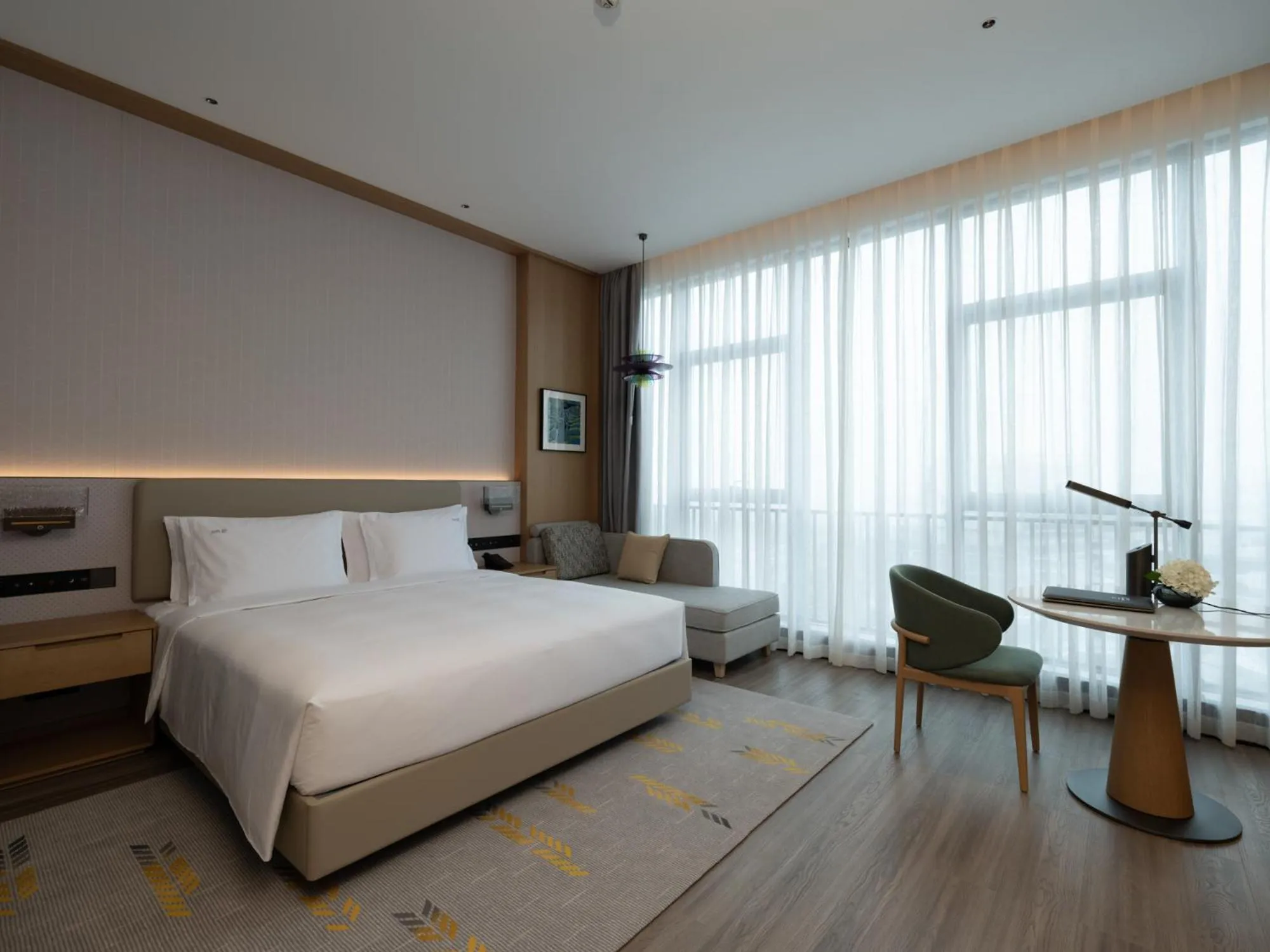 Photo of the whole room, Bed in Holiday Inn Guiyang Airport by IHG