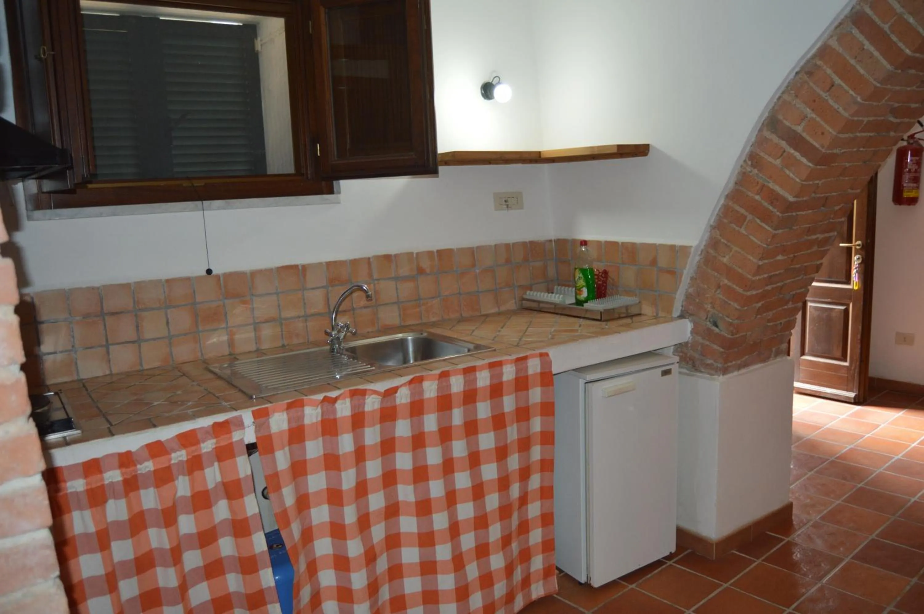Kitchen or kitchenette in Casa Sarticola