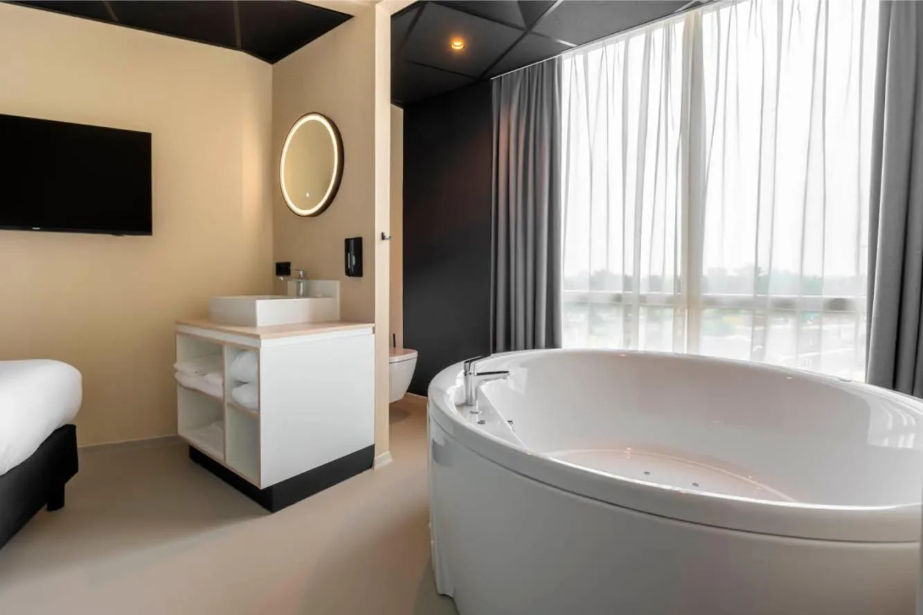 Bed in Waterstate Wellness hotel Goes