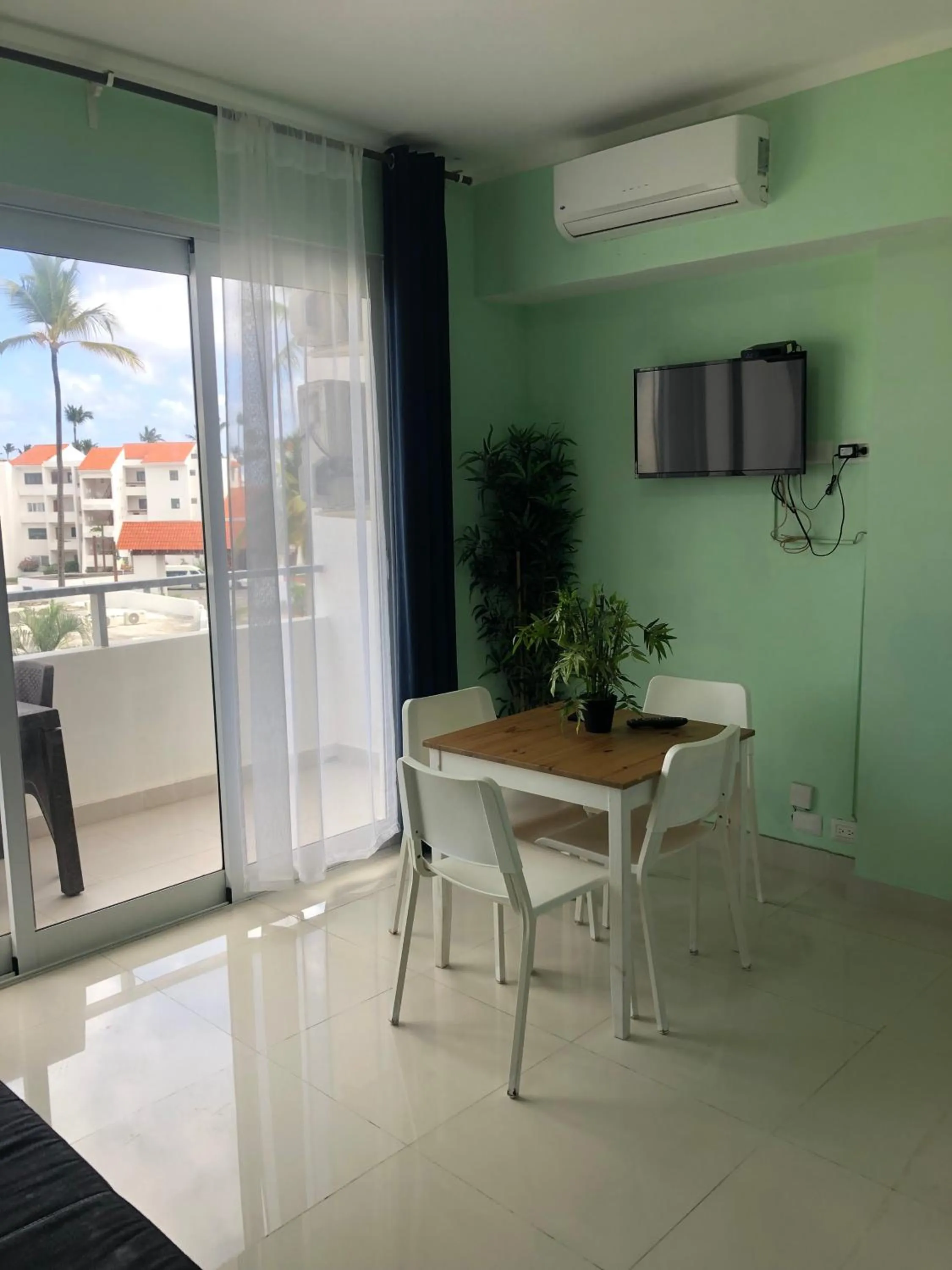 Dining Area in Ducassi Rooftop Pool Suites Beach Club and SPA
