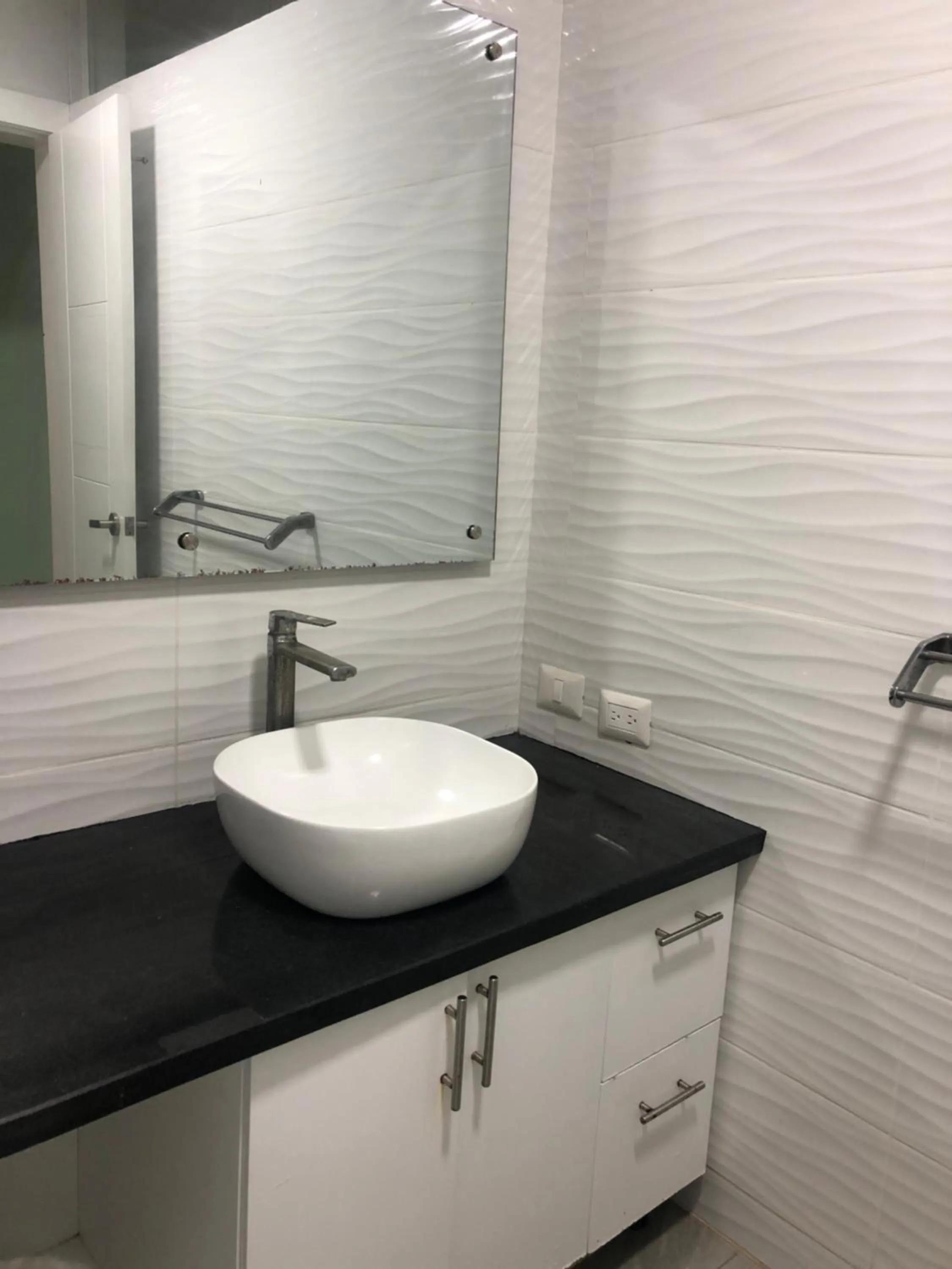 Bathroom in Ducassi Rooftop Pool Suites Beach Club and SPA