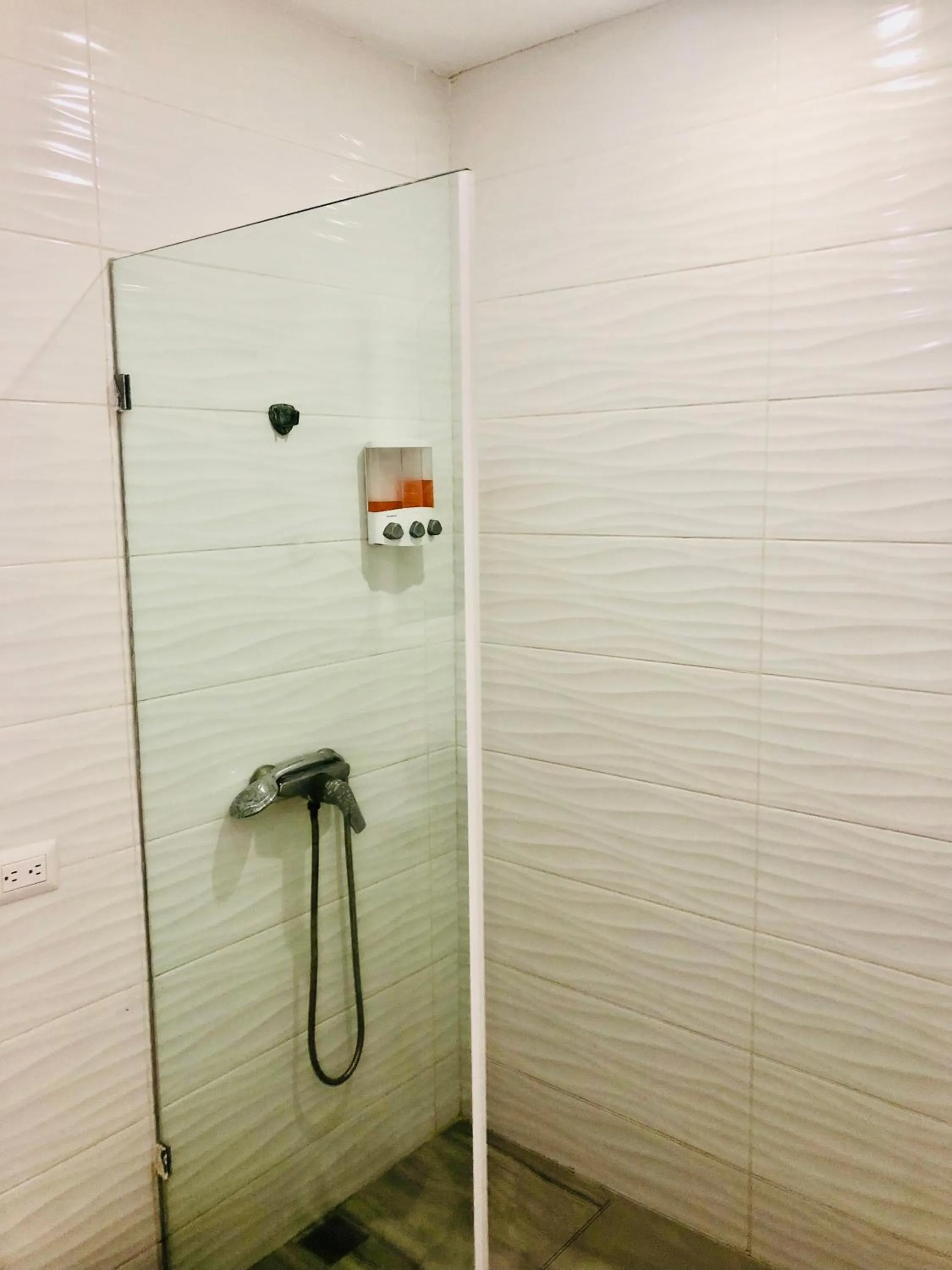 Bathroom in Ducassi Rooftop Pool Suites Beach Club and SPA