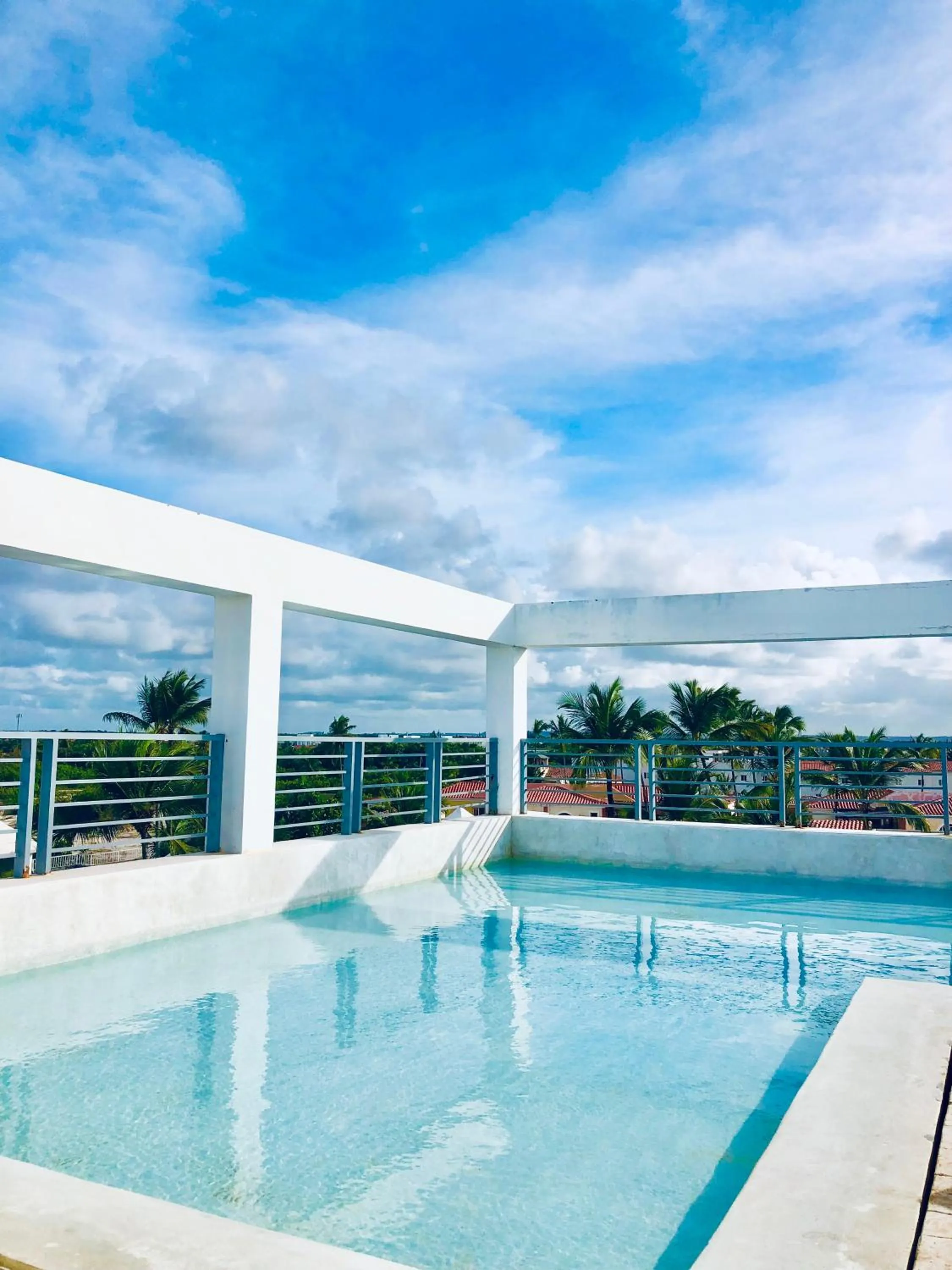Swimming Pool in Ducassi Rooftop Pool Suites Beach Club and SPA