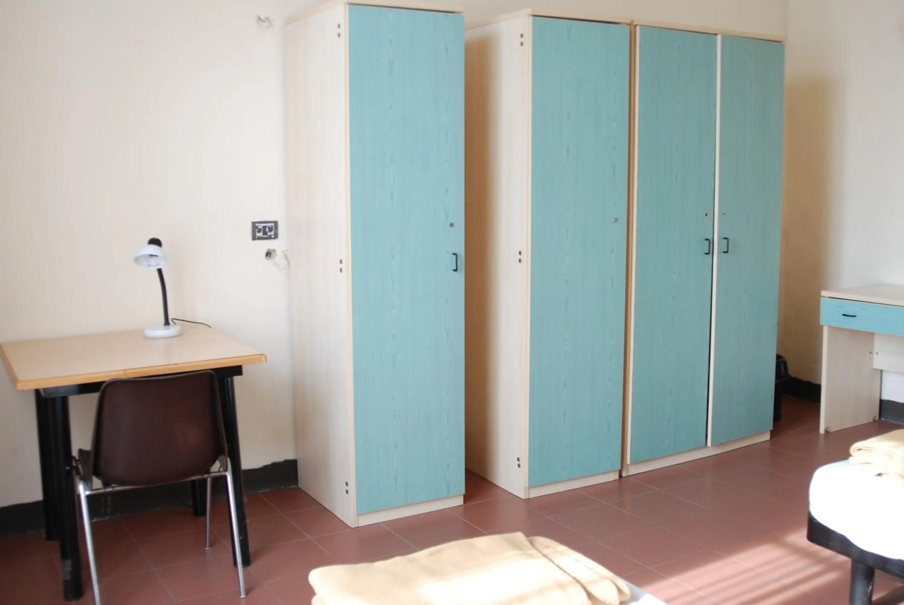 Quadruple Room with Shared Bathroom - single occupancy in Il Chiostro Hostel and Hotel