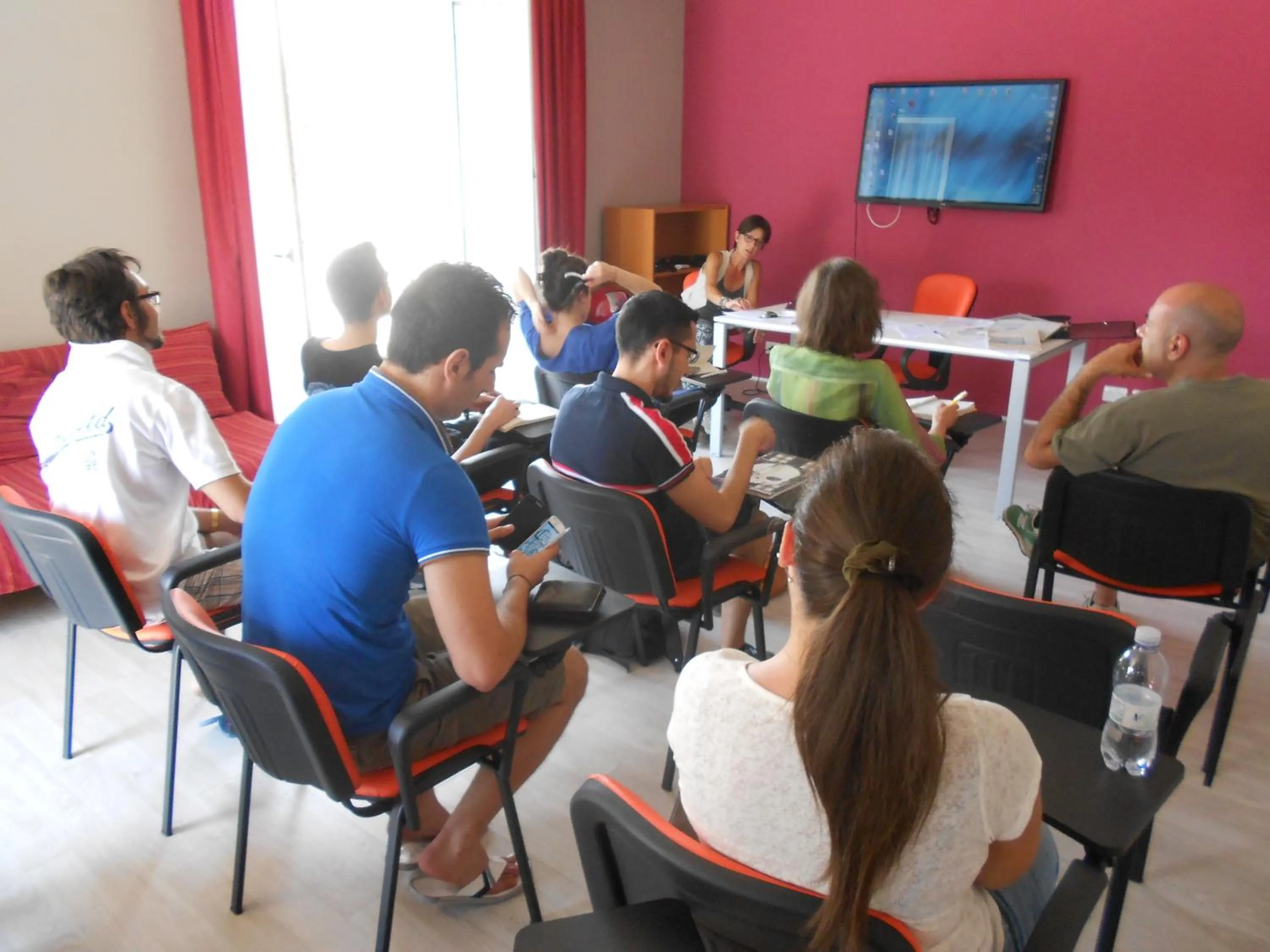 Communal lounge/ TV room in Ostello Torino