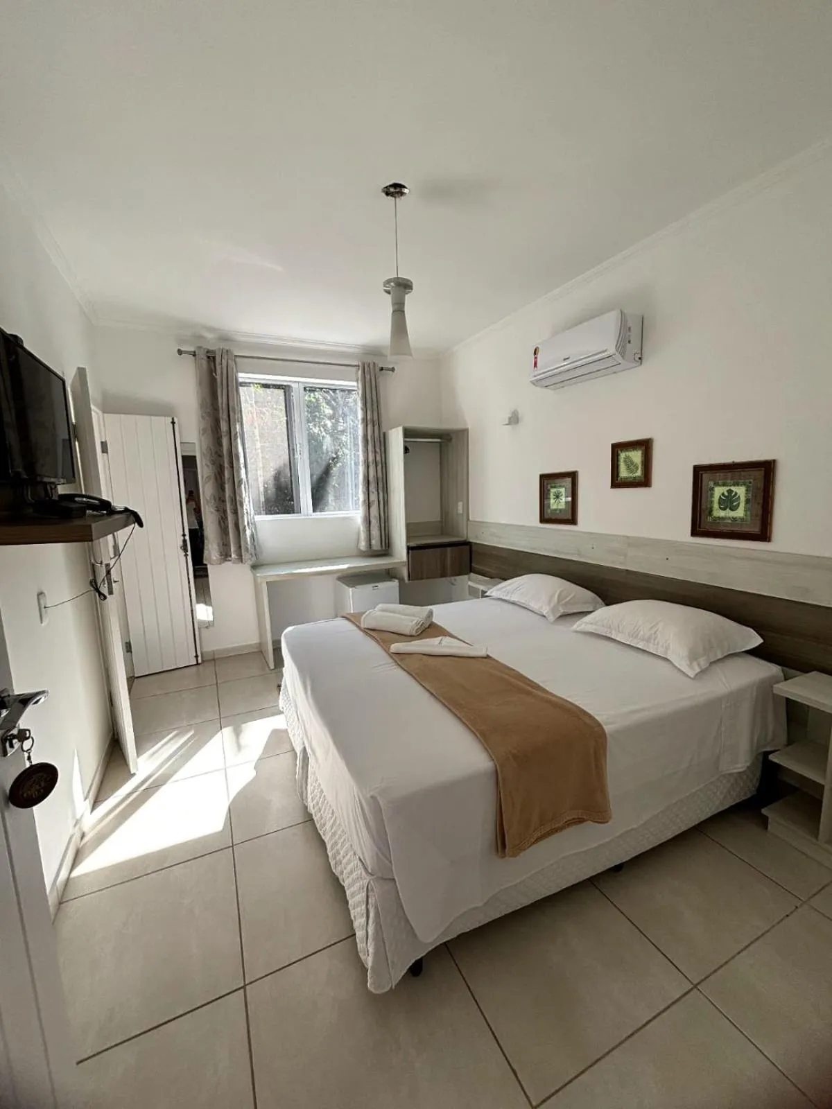 Bed in Pousada Recanto Jota Ge