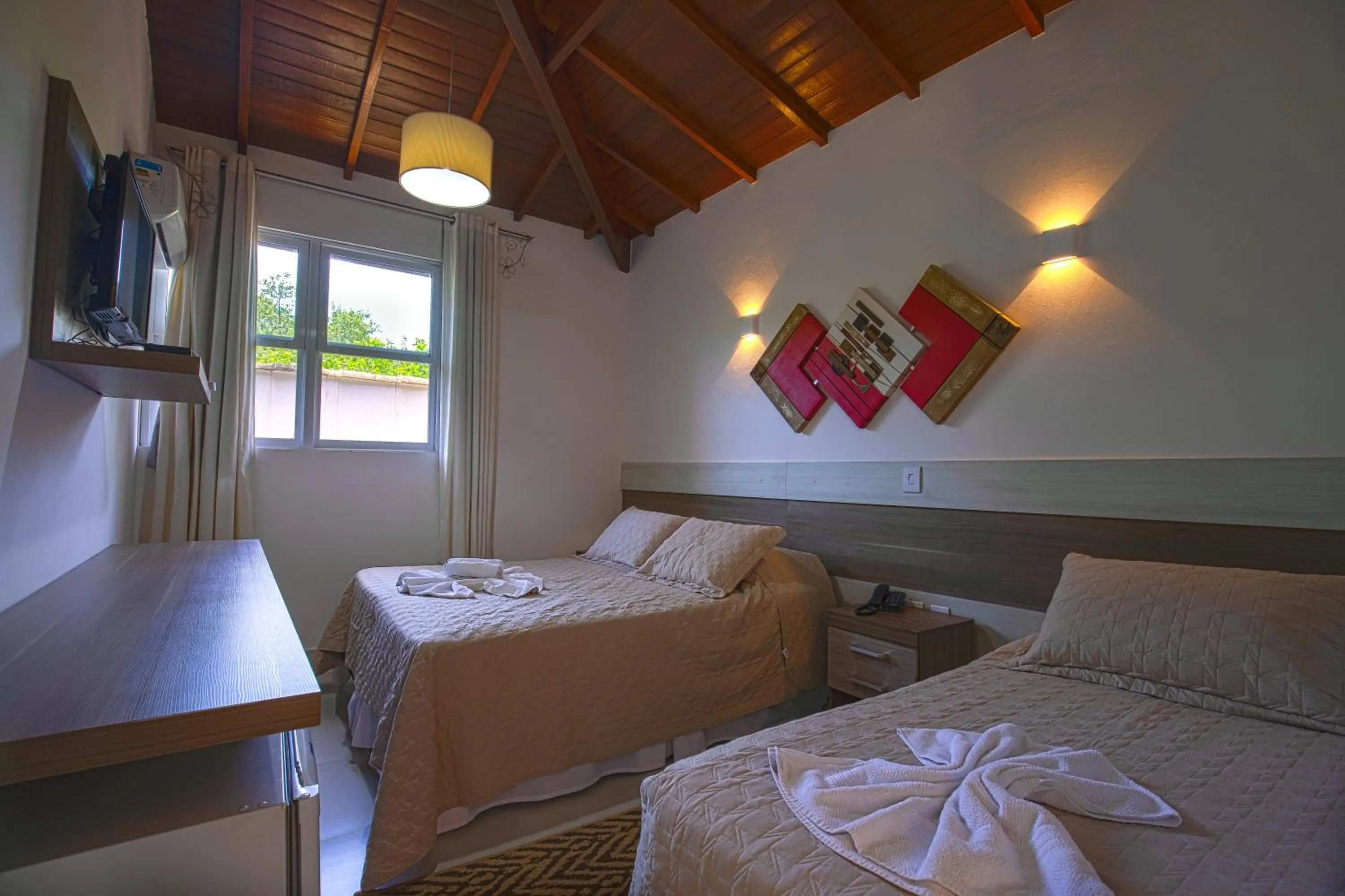 Bed in Pousada Recanto Jota Ge